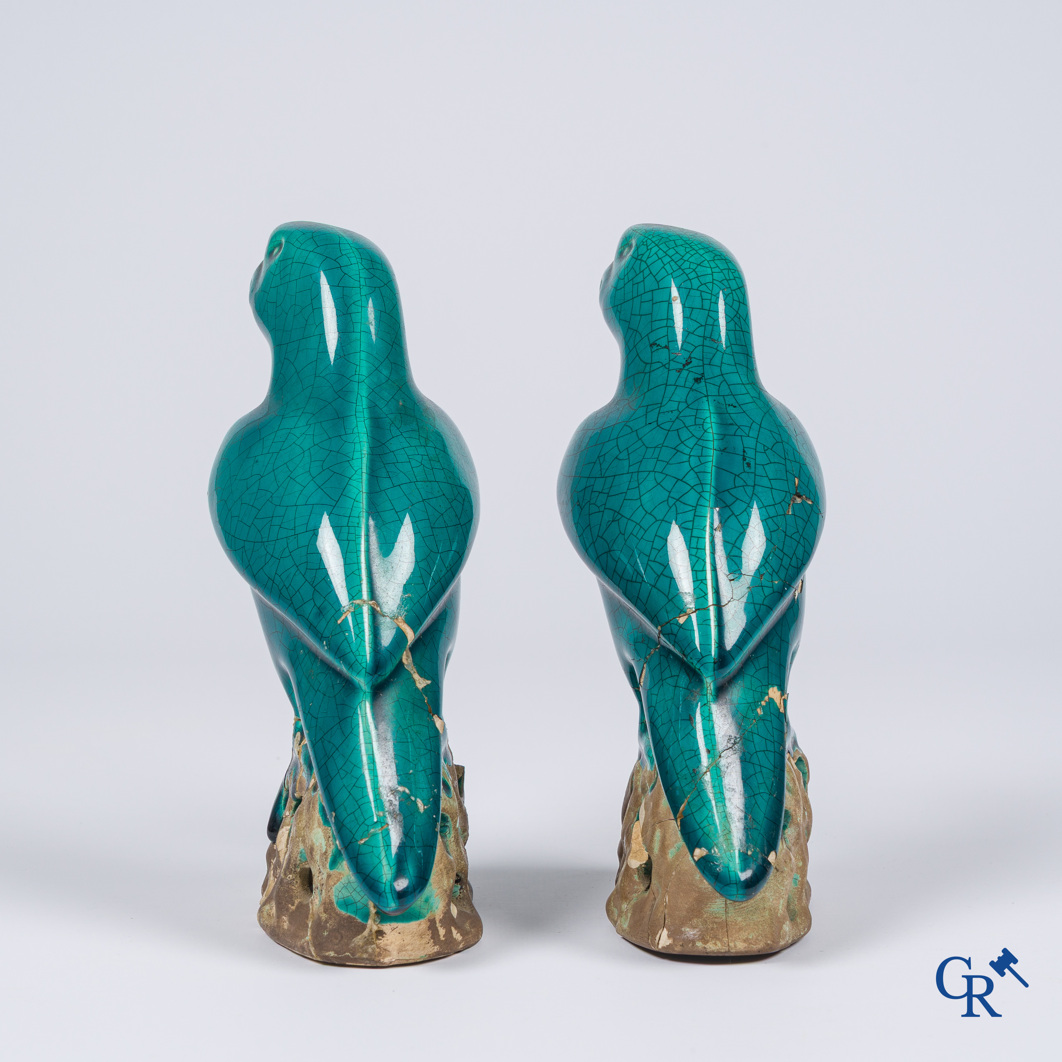 Asian Art, a pair of turquoise glazed ceramic parrots.