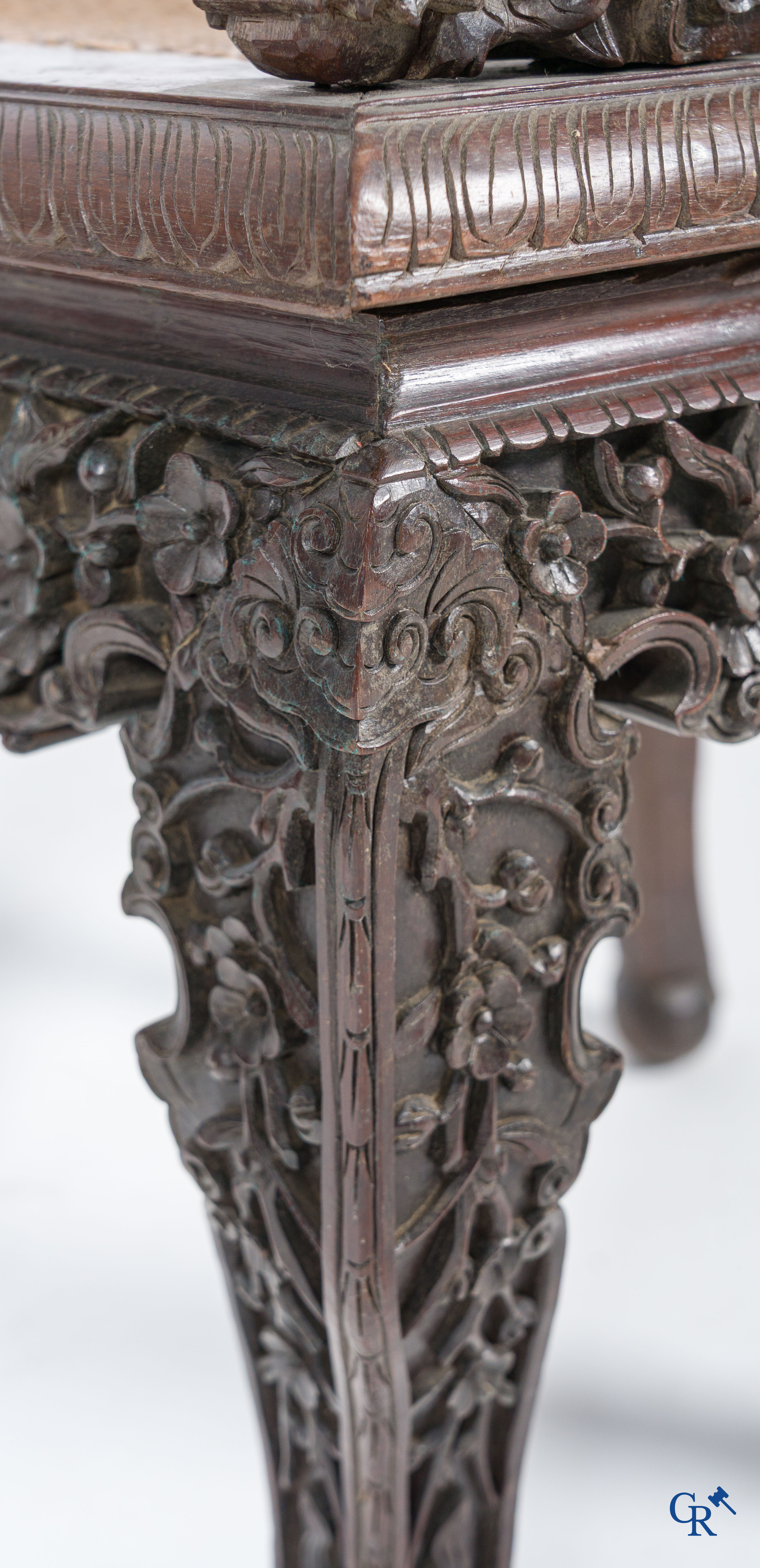 Asian Art, A pair of richly carved chairs with bats, dragons and flowers in Chinese hardwood. 19th century.