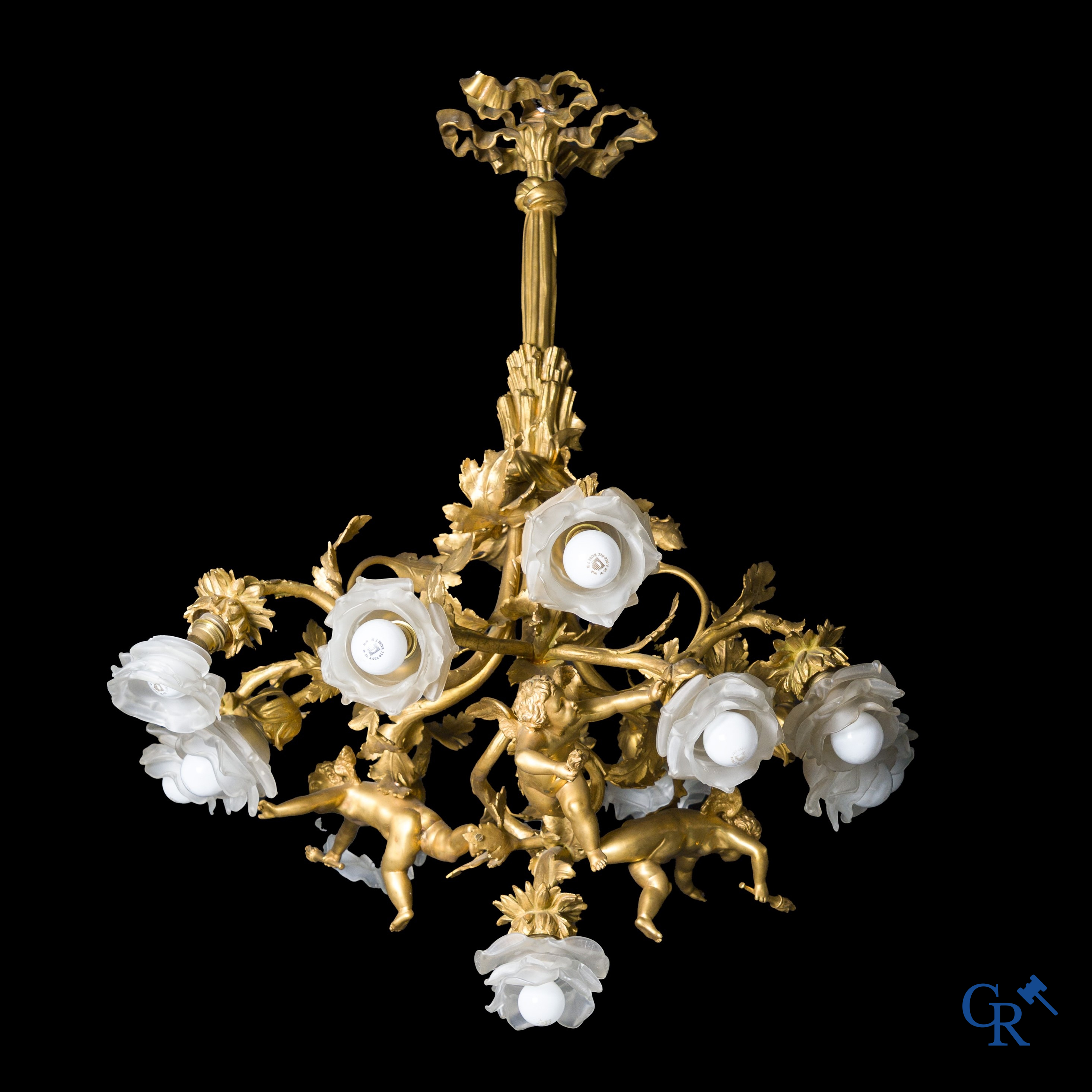 An imposing bronze gilded Napoleon III chandelier with 3 putti and 13 light points. LXVI style.