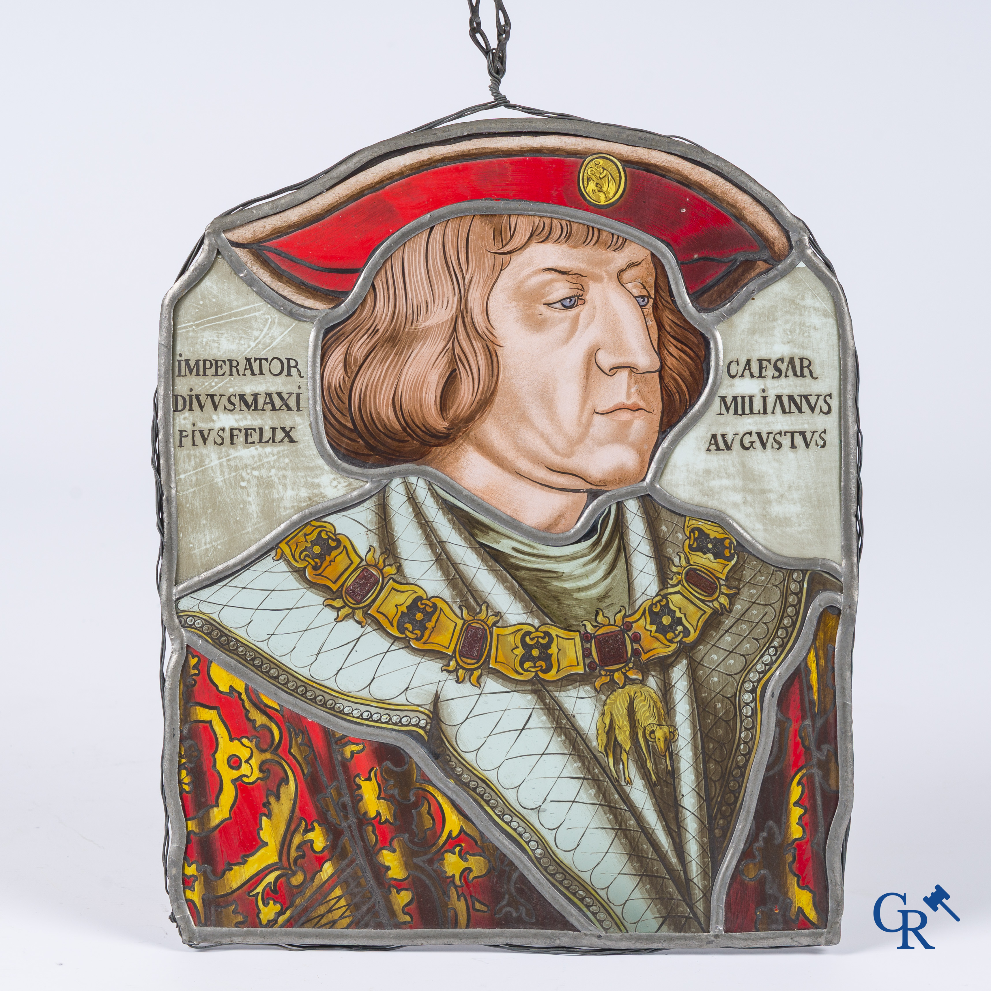 A fragment of an antique stained glass with the portrait of Maximilian I of Austria.