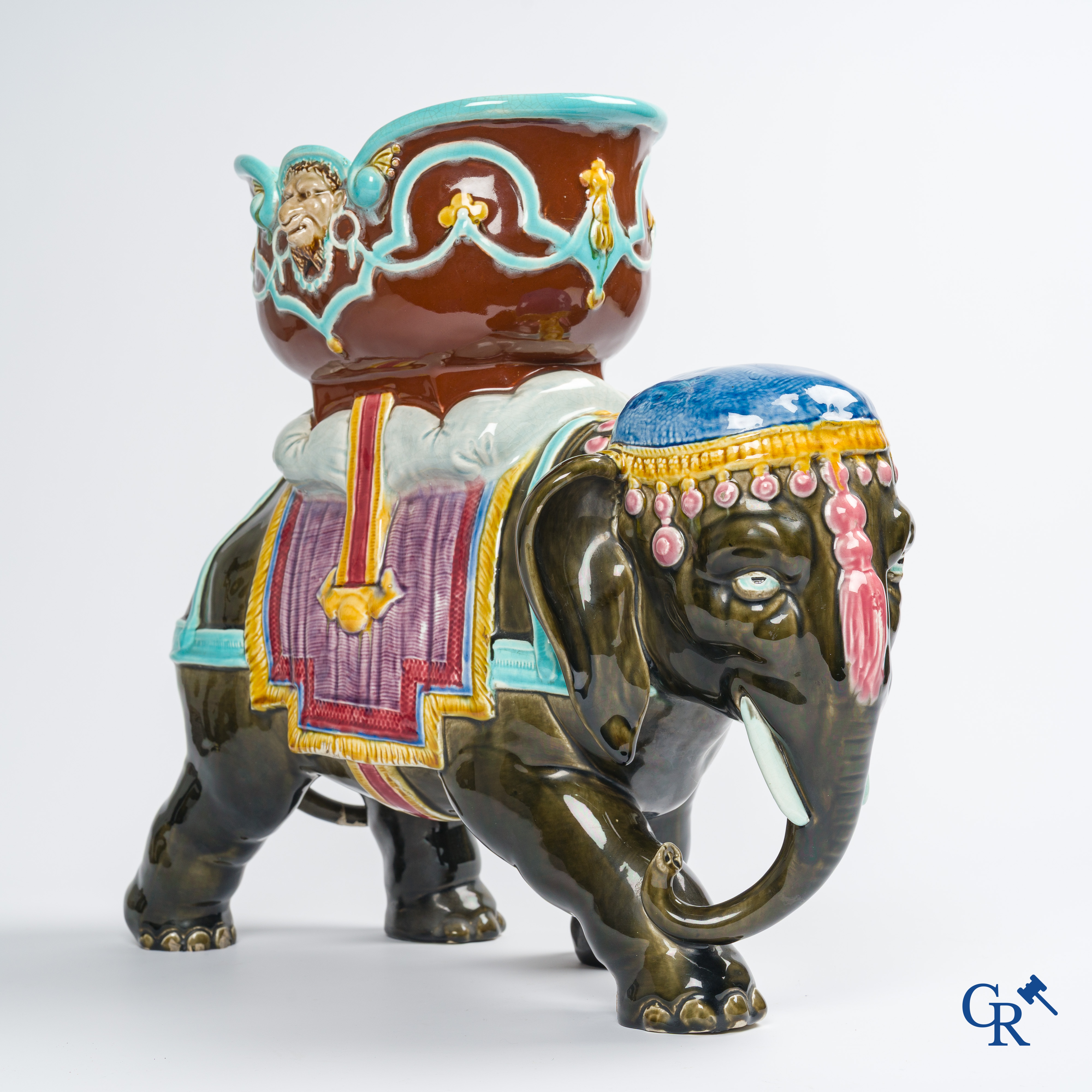 Orchies. A large elephant in multicolored decorated pottery, barbotine. France, circa 1900.