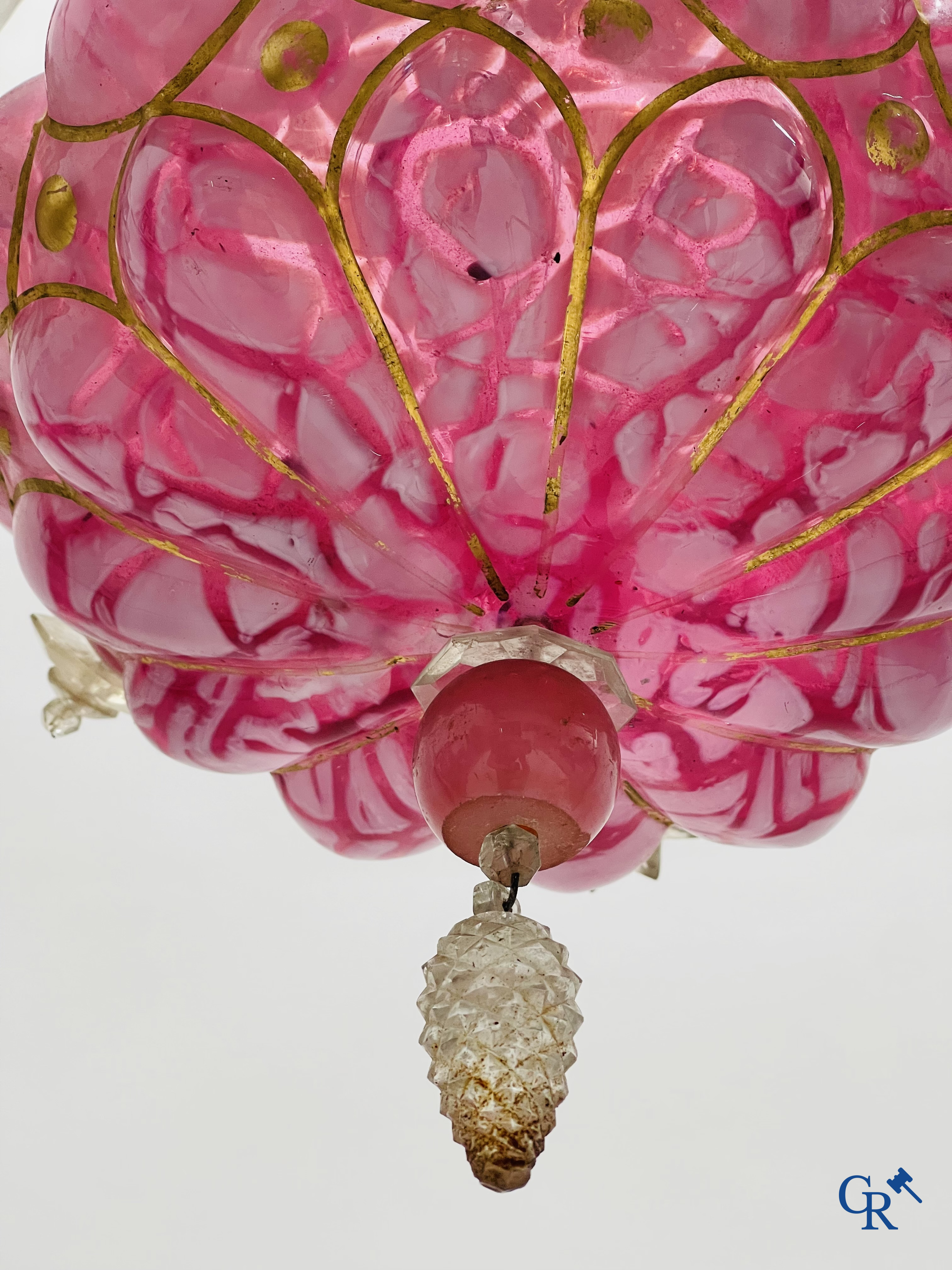 A chandelier in pink opaline and gilded frames with mounted crystal in the style of Baccarat. Circa 1860.