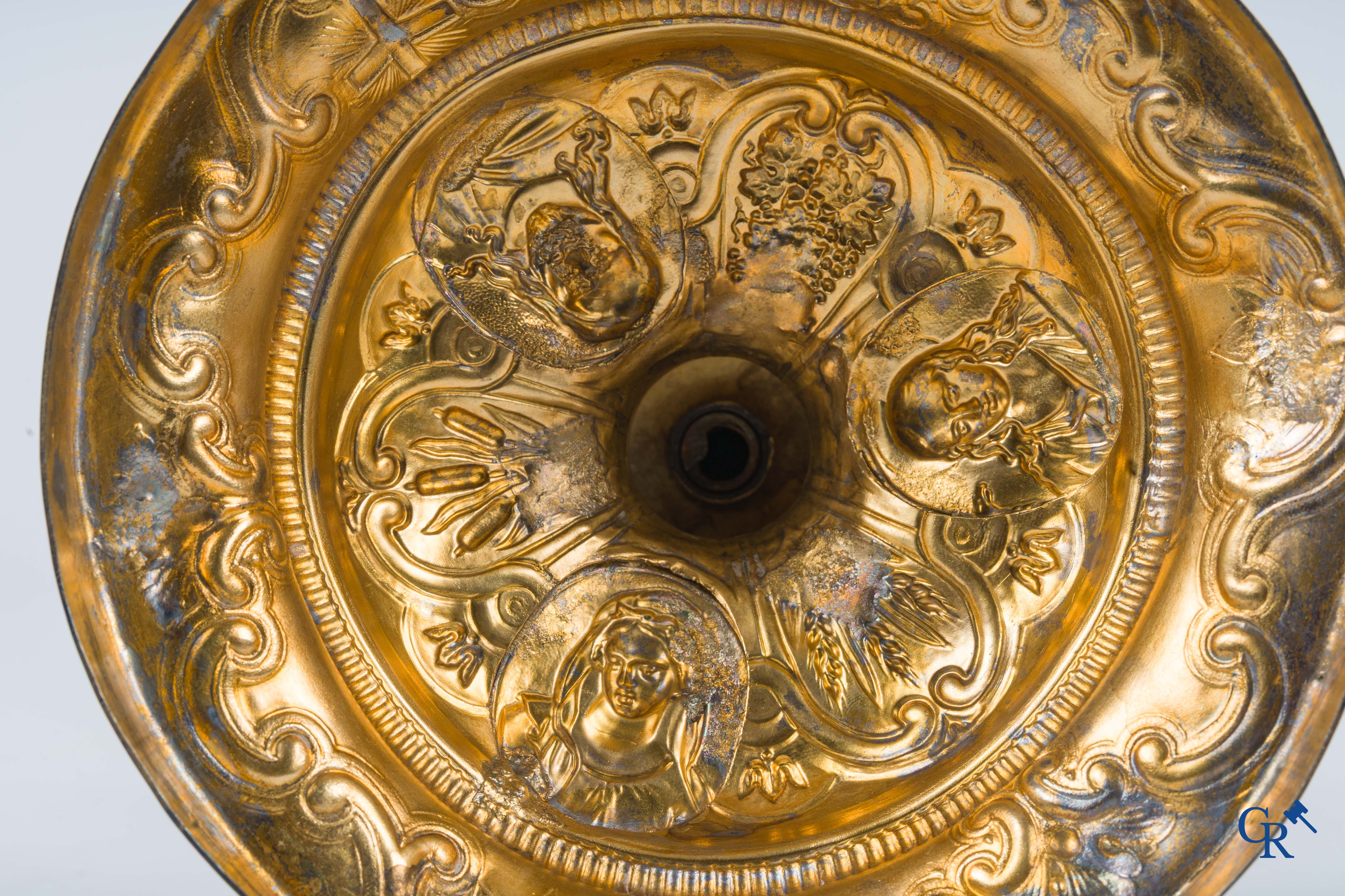 Martin & Dejean, orfèvres. A relief decorated chalice in silver and vermeil. Paris, 1st half of the 19th century.