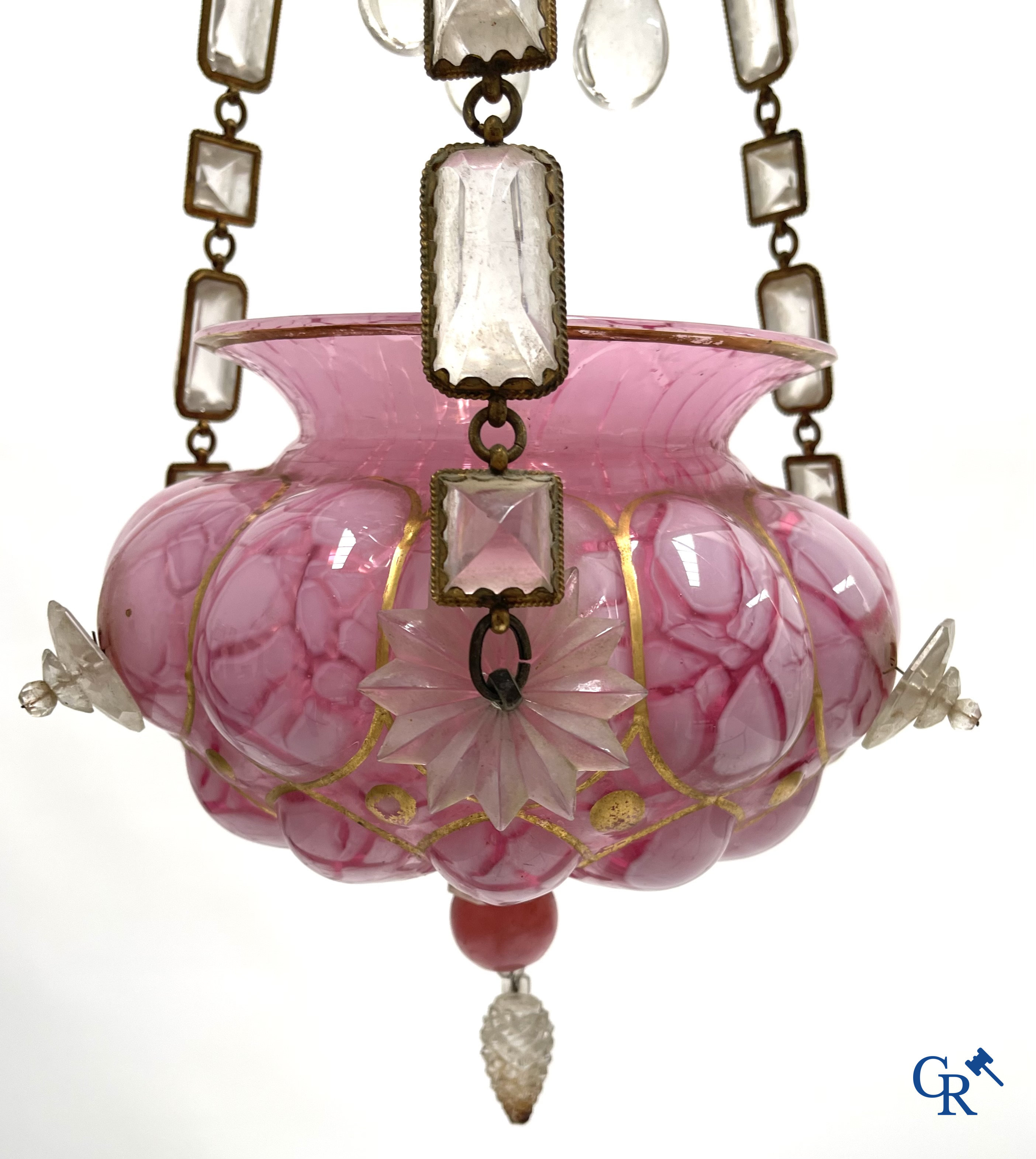 A chandelier in pink opaline and gilded frames with mounted crystal in the style of Baccarat. Circa 1860.