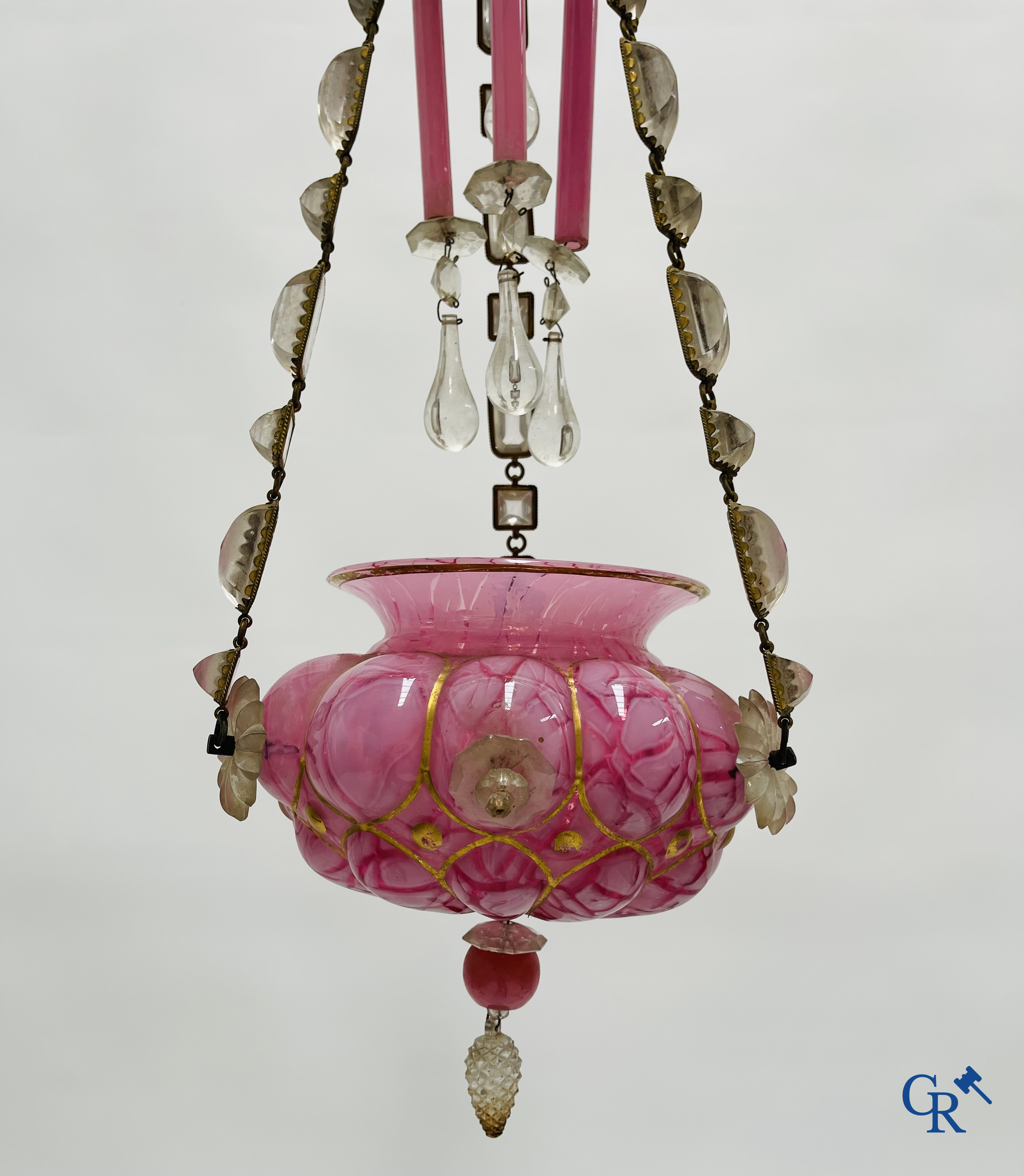 A chandelier in pink opaline and gilded frames with mounted crystal in the style of Baccarat. Circa 1860.