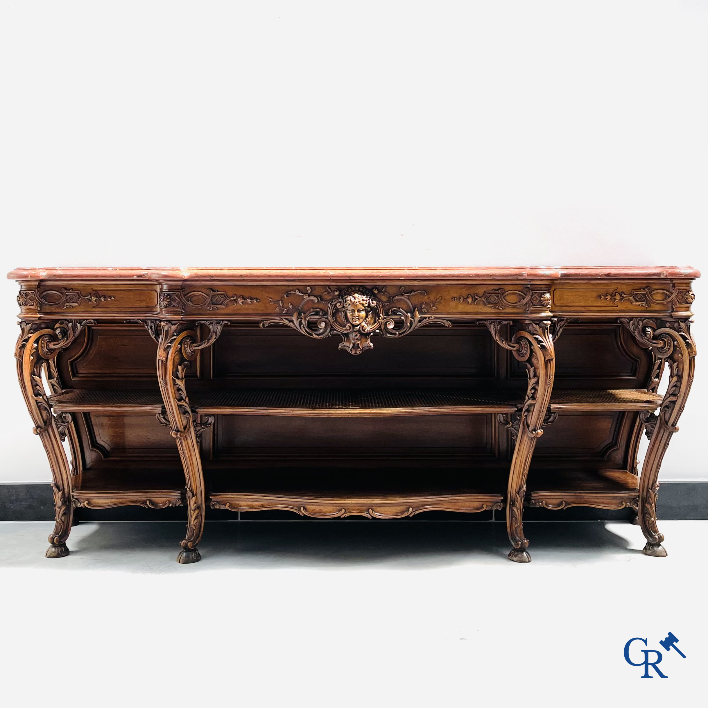 Maison Roll, 42, Rue Faubourg St. Antoine Paris. An exceptionally dessert furniture in carved walnut. LXVI style.