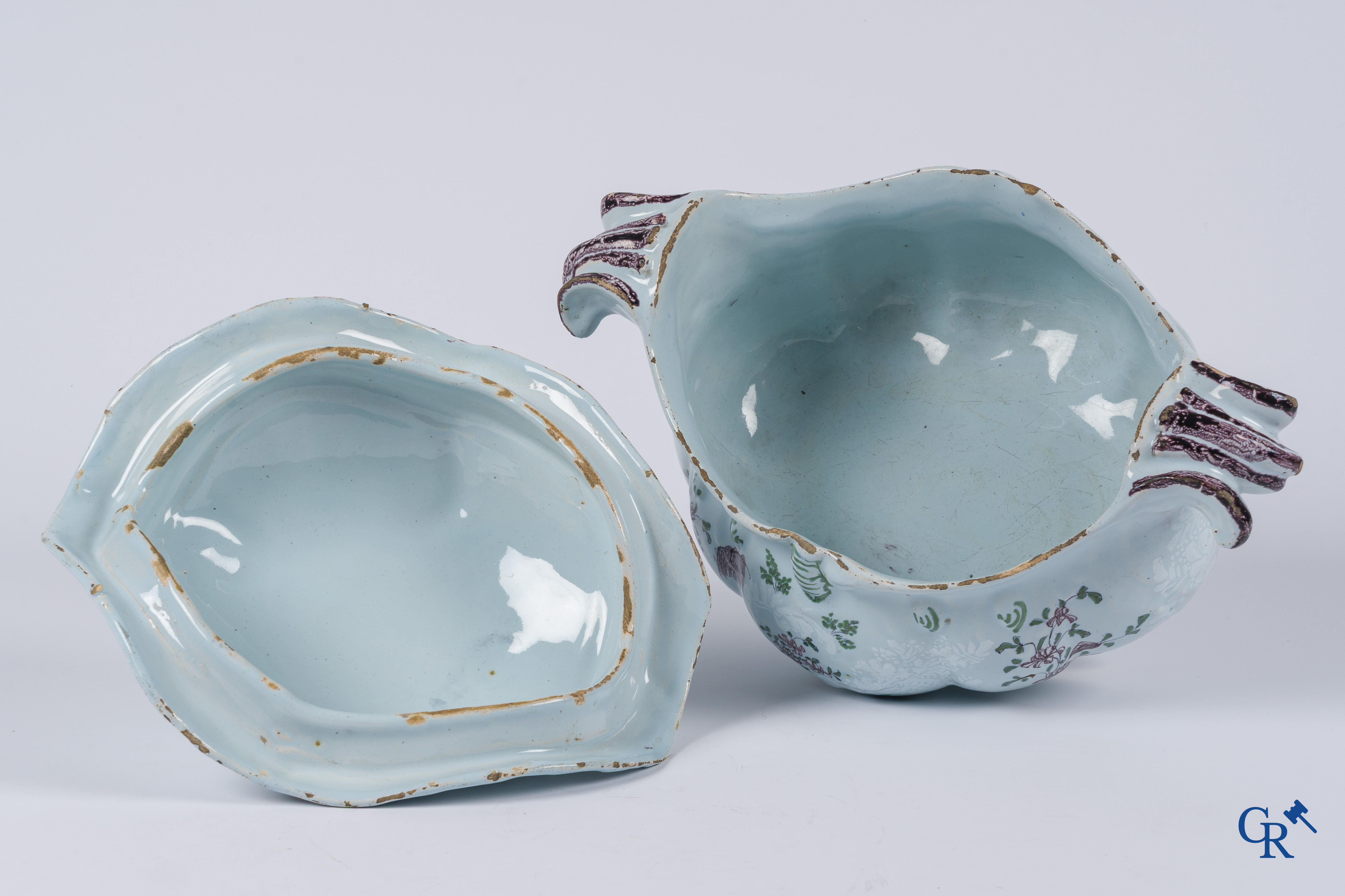 Earthenware. A large 18th century tureen and its lid in enamelled faience.