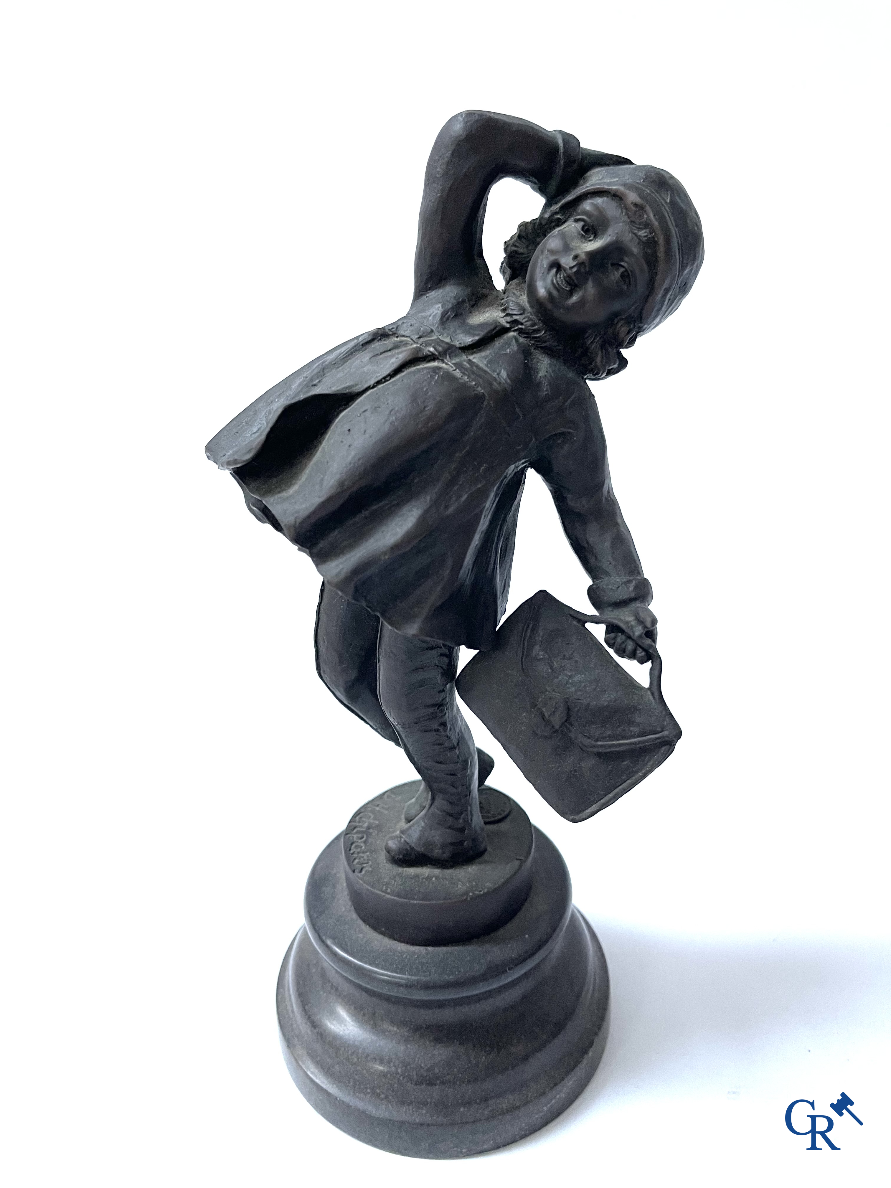 A bronze group after Raoul Larche with 5 children and a basket and 2 bronze statuettes after Chiparus. Posthumous 20th century.