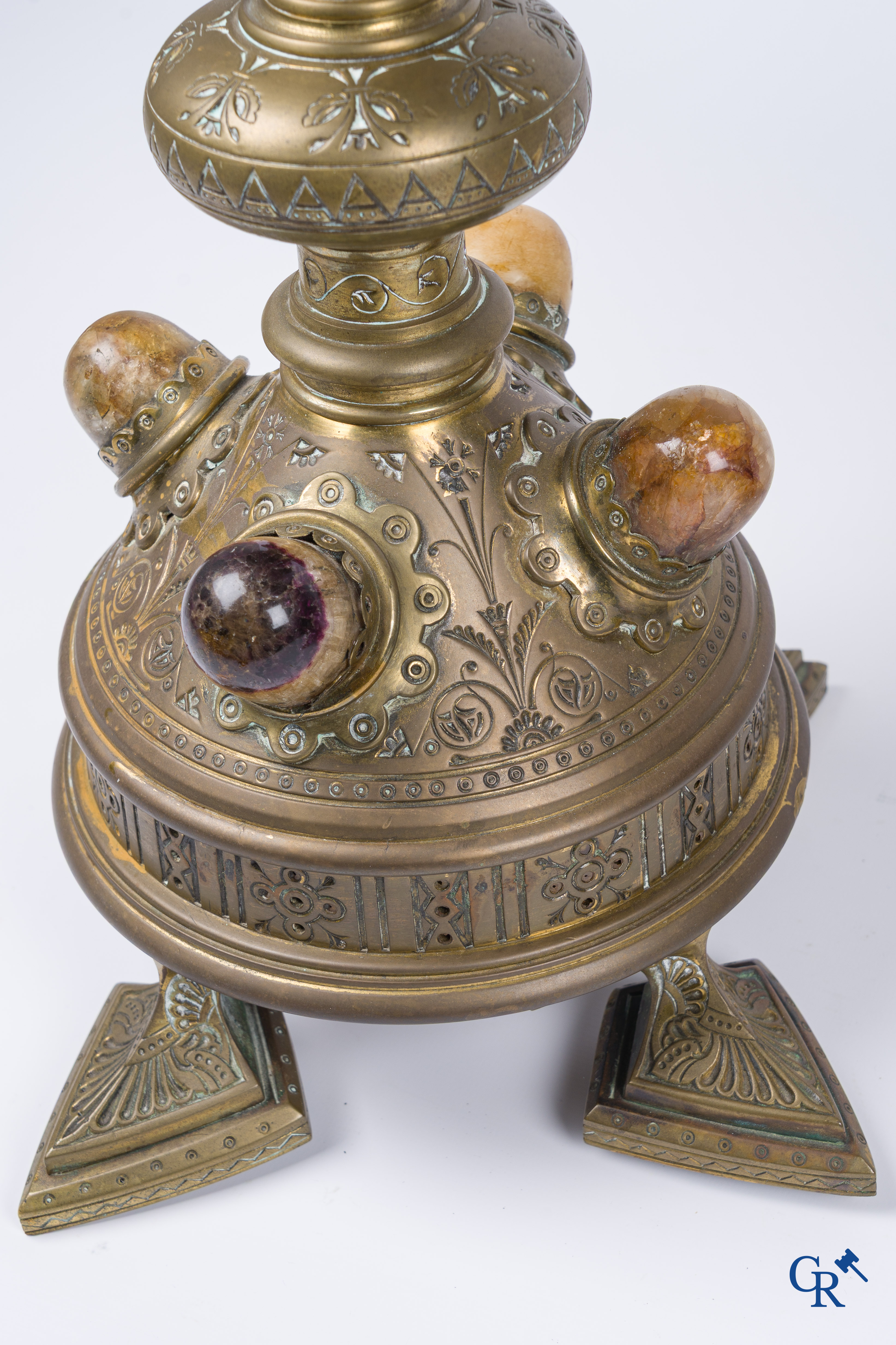 A pair of important bronze candlesticks decorated with various types of rock including amethyst. 19th century.