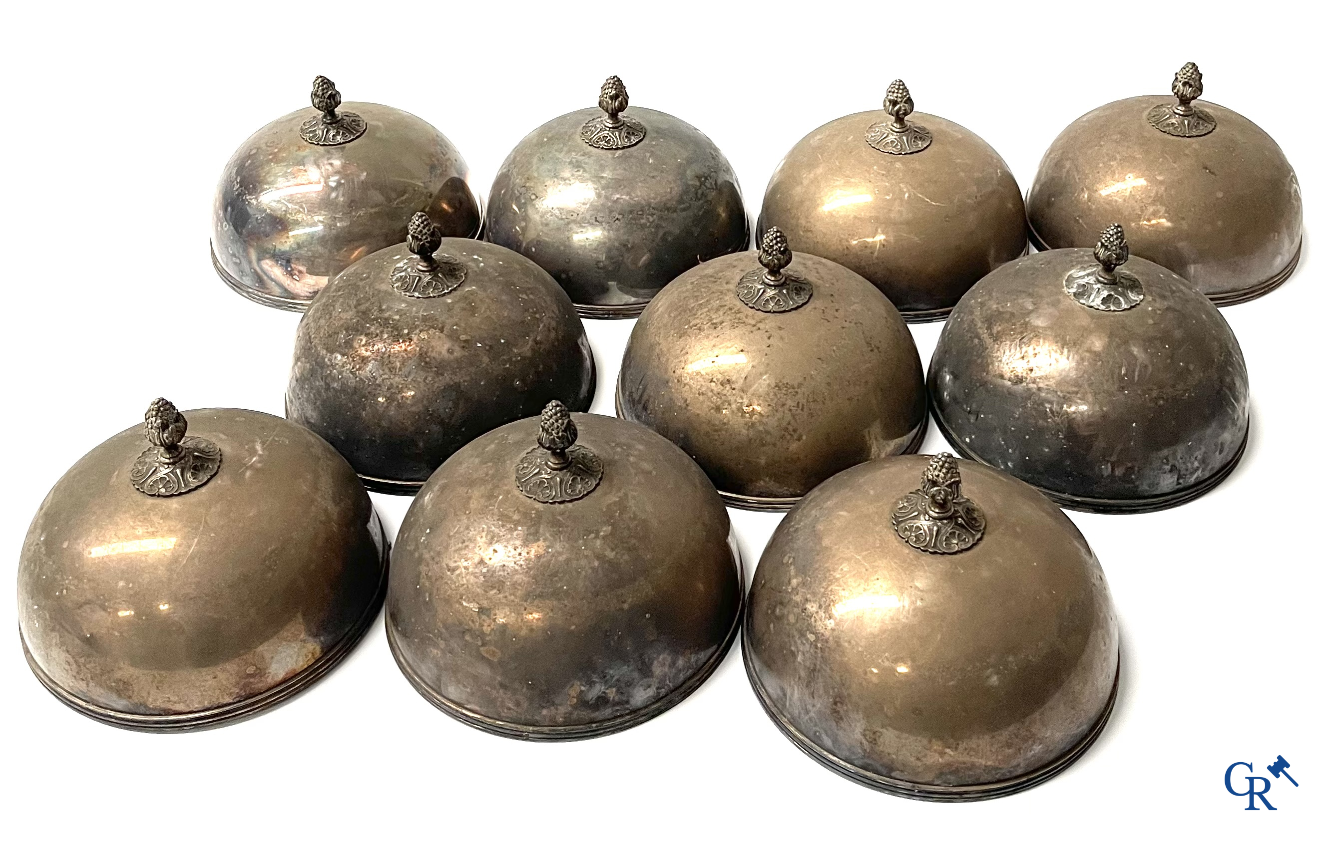 A set of 10 silver-plated metal table bells, a carafe with silver frame, silver napkin rings, a sprinkler bus, etc.