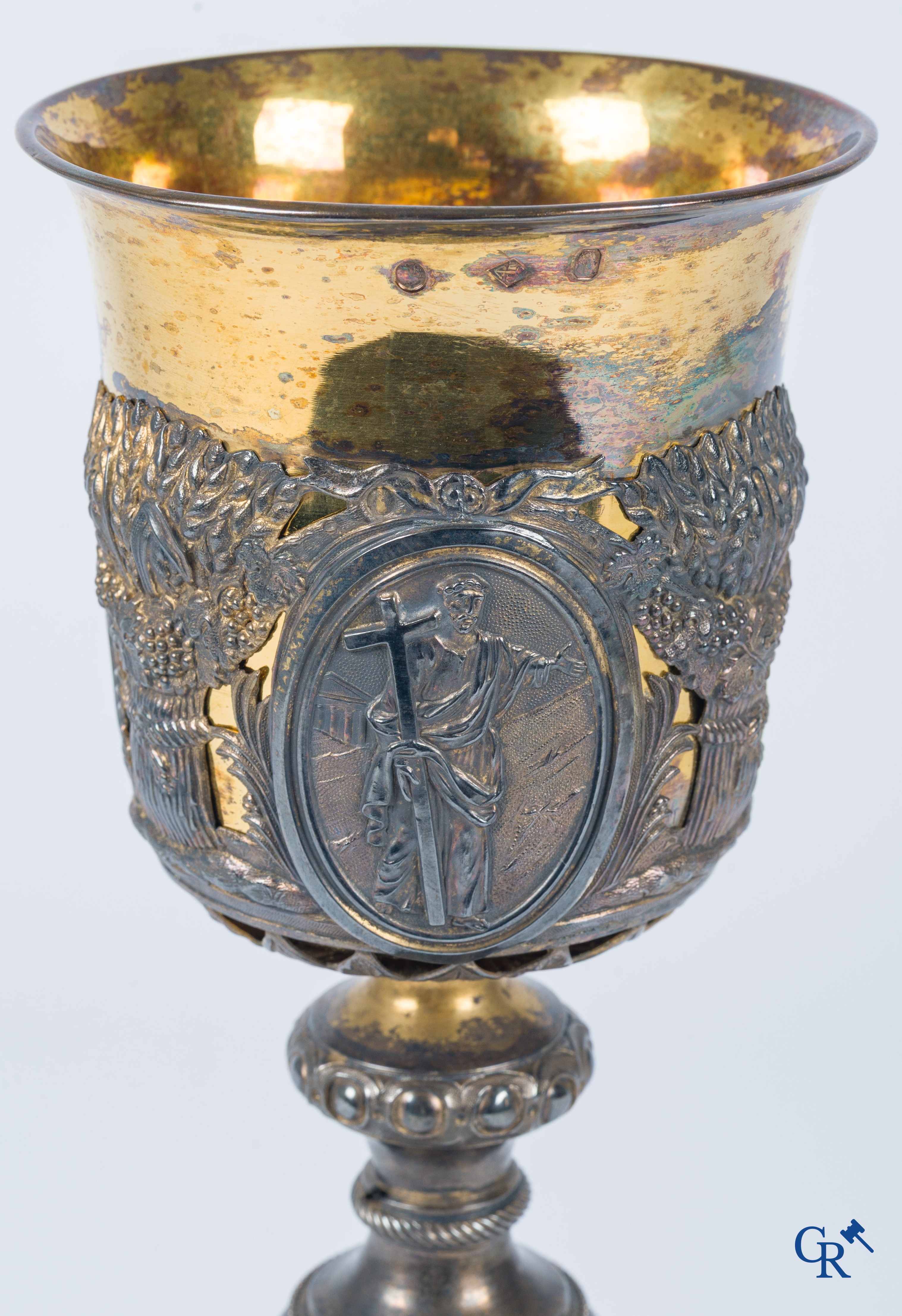 Martin & Dejean, orfèvres. A relief decorated chalice in silver and vermeil. Paris, 1st half of the 19th century.
