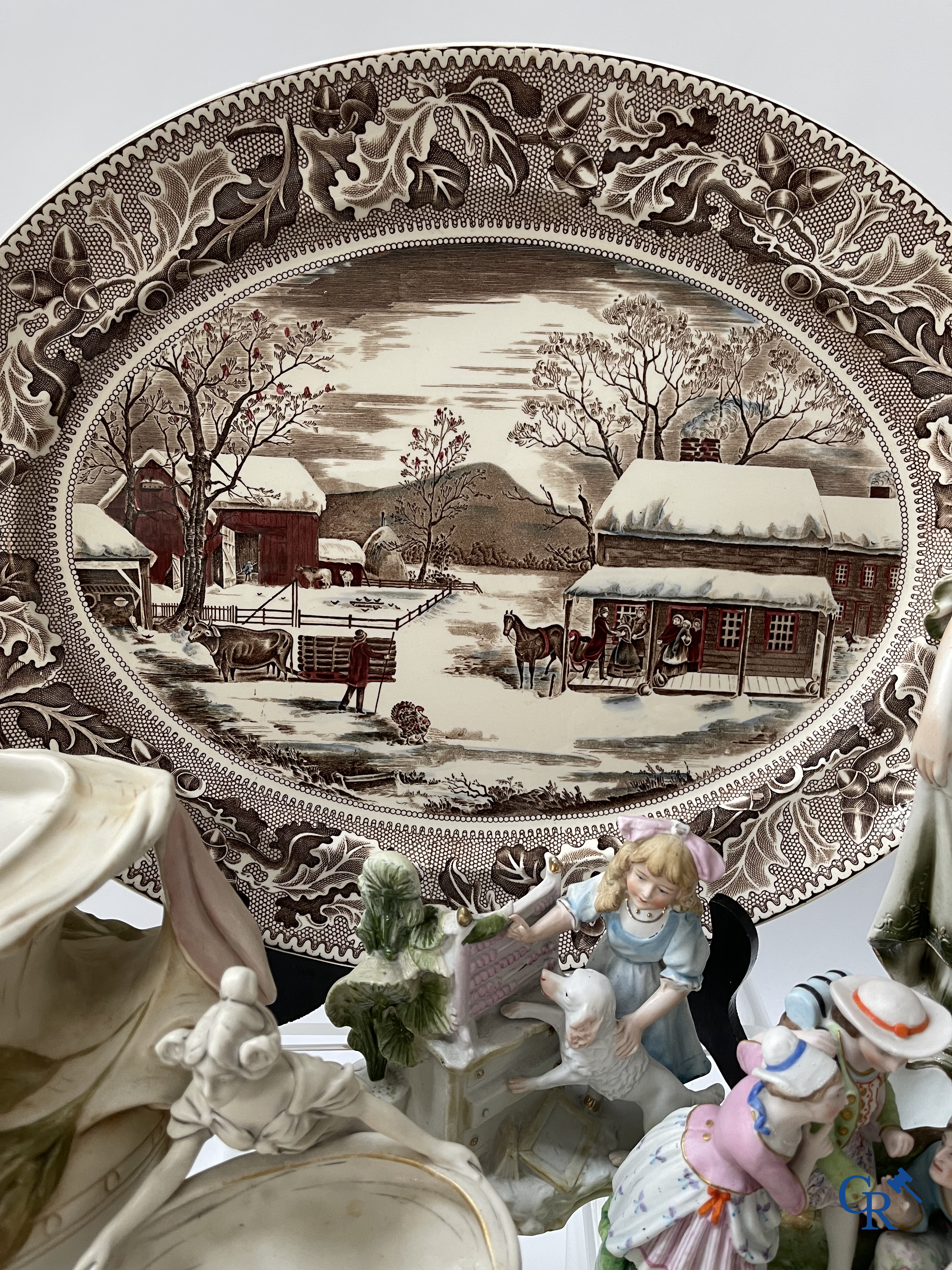 A large lot of brocante including Royal Dux, Biscuit statues, porcelain, globes, spelter statues, table lamp, chandelier etc.