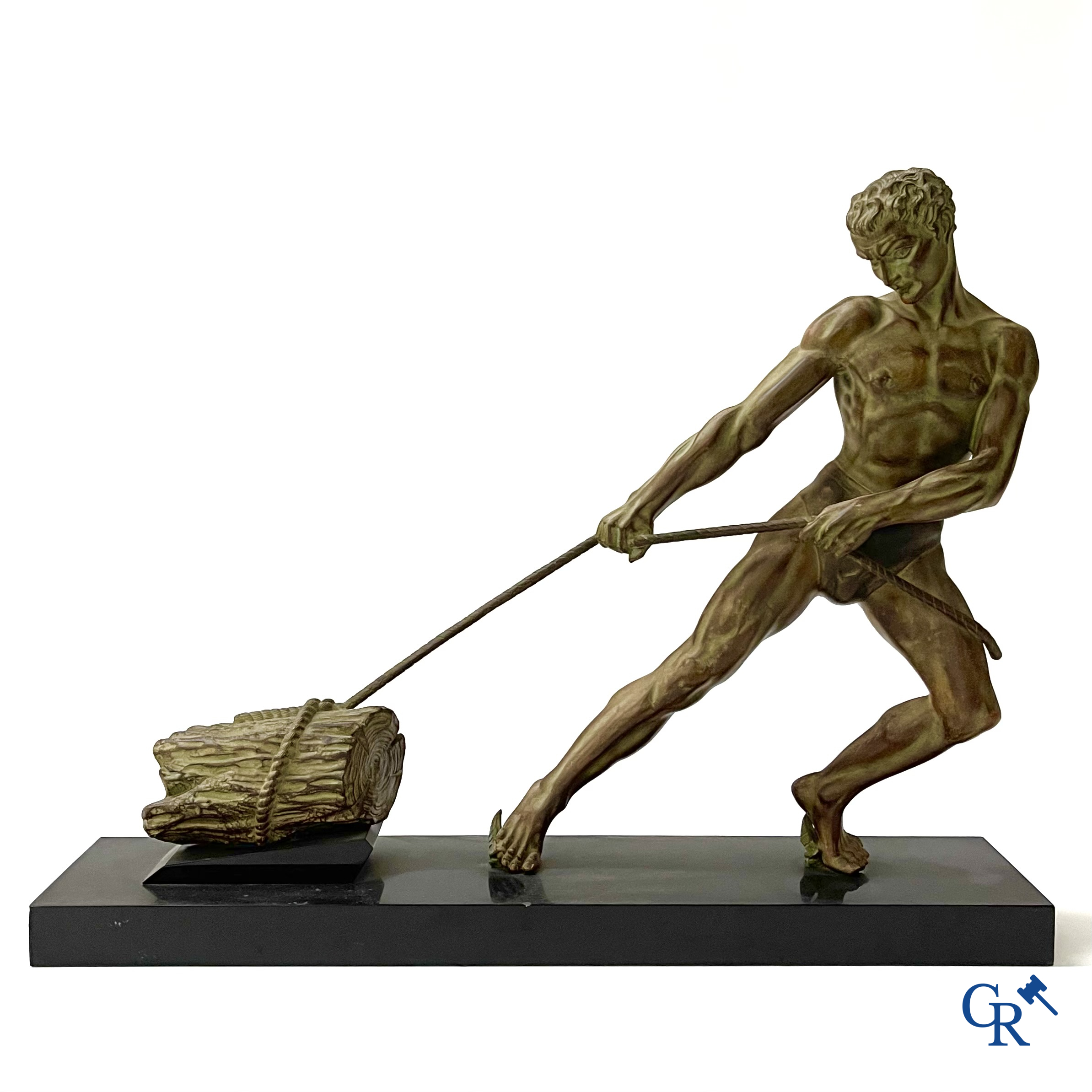 Art deco, a statue in green-brown patinated spelter on a black marble base. Around 1930.