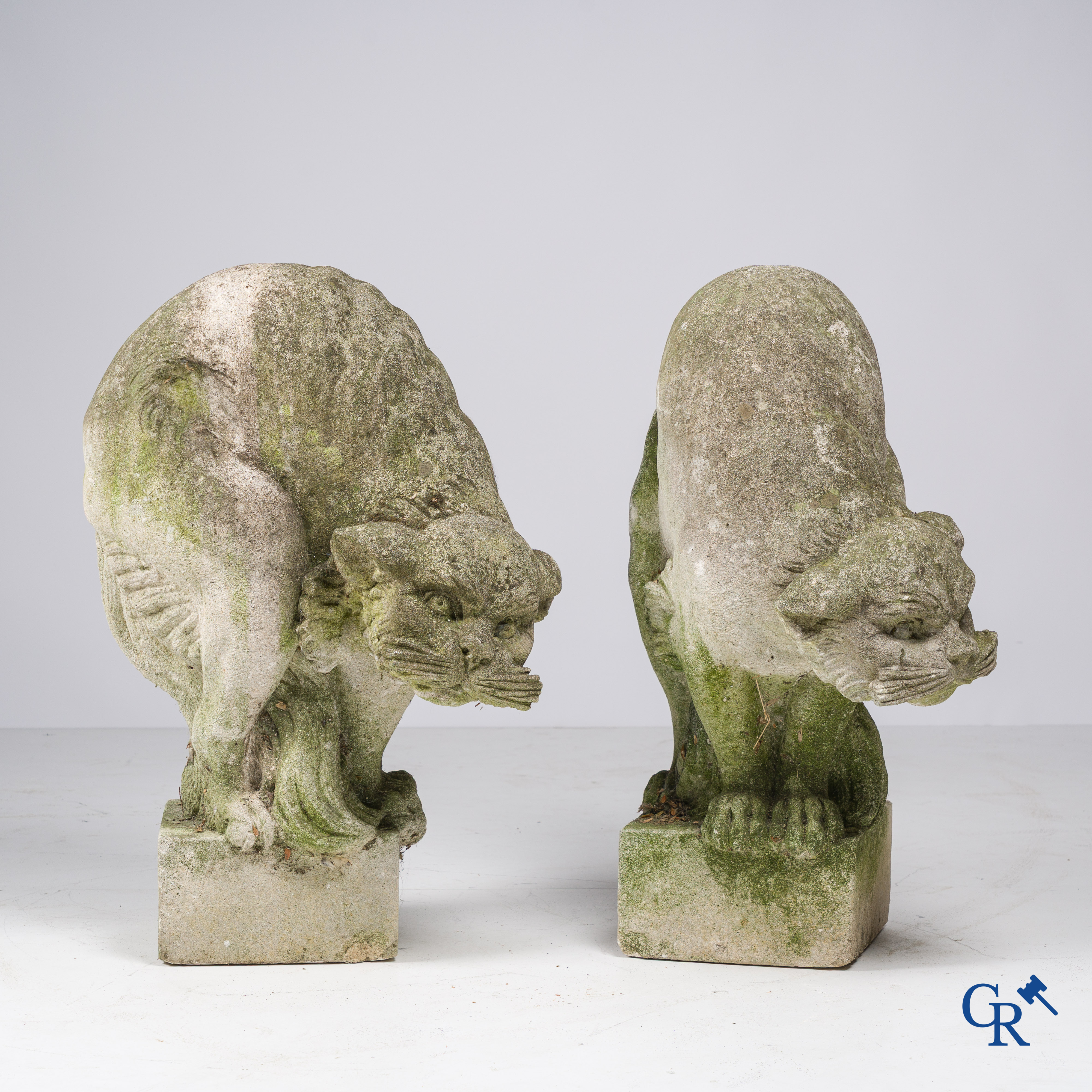 Exceptionally pair of large ornaments depicting cats in hand-sculpted limestone. Circa 1900.