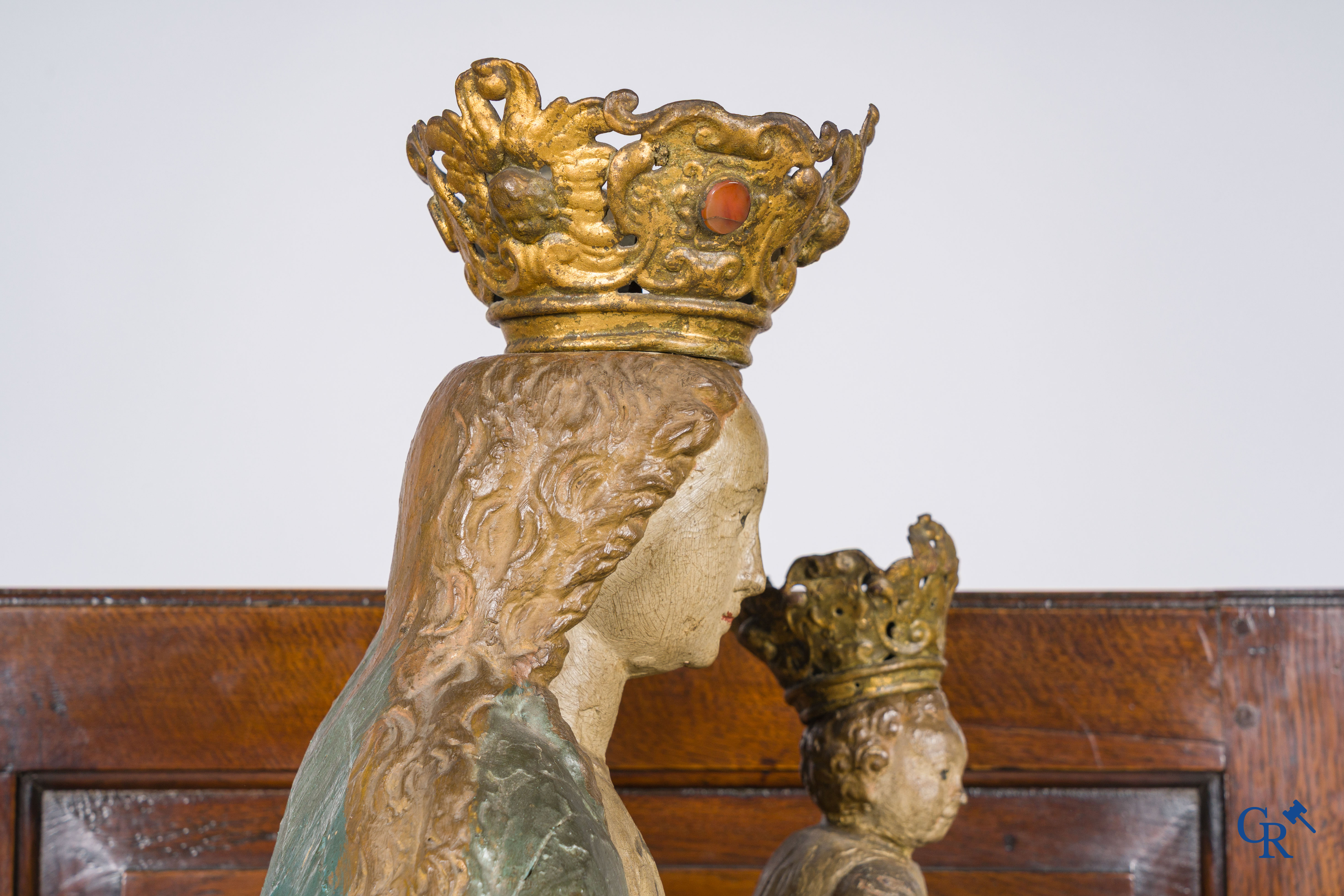 Wooden polychrome Baroque sculpture of Mary with child. The Crown inlaid with an amber-like rock.