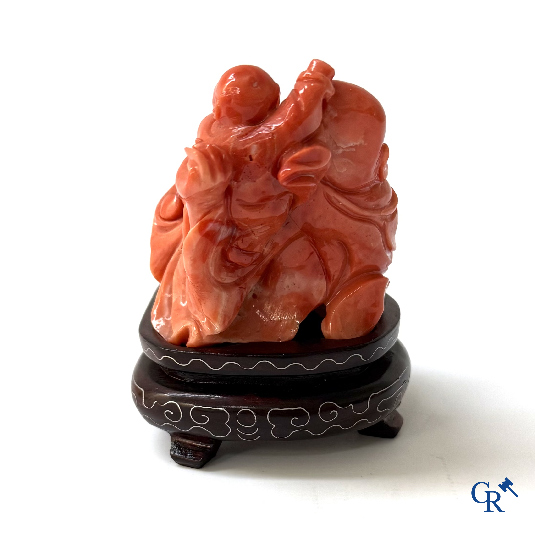 Asian Art, a Chinese carved red coral Buddha figure with child.