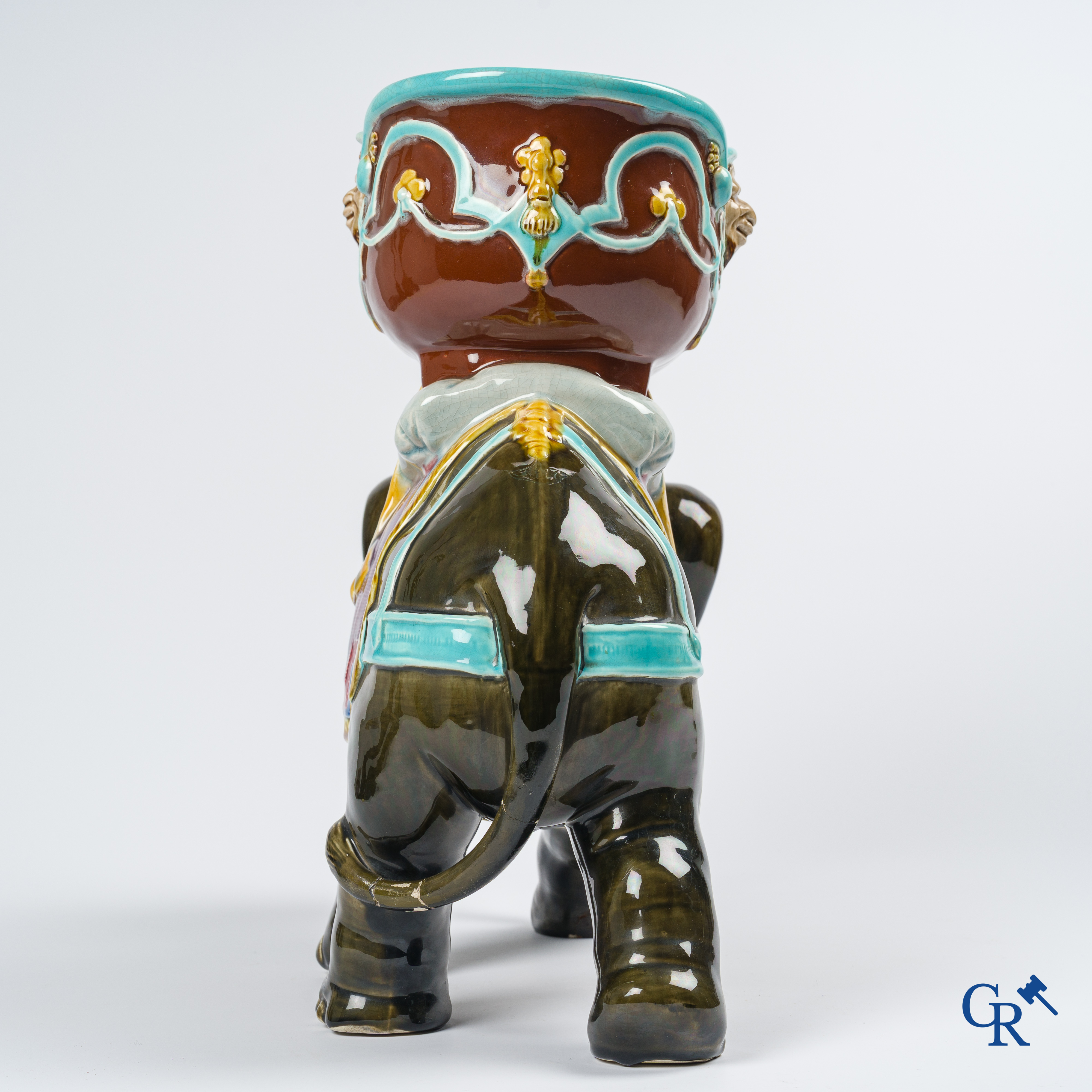 Orchies. A large elephant in multicolored decorated pottery, barbotine. France, circa 1900.