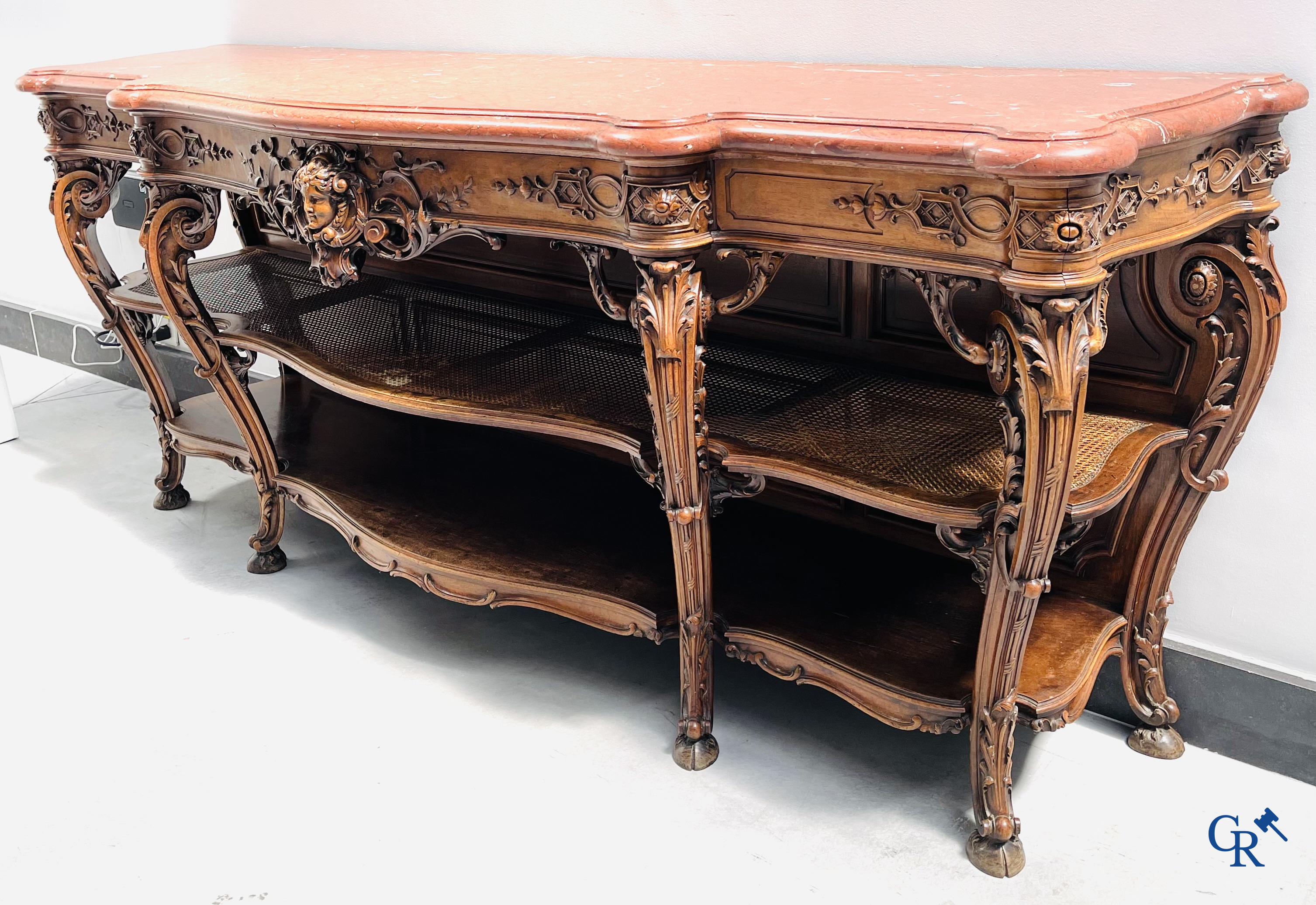 Maison Roll, 42, Rue Faubourg St. Antoine Paris. An exceptionally dessert furniture in carved walnut. LXVI style.