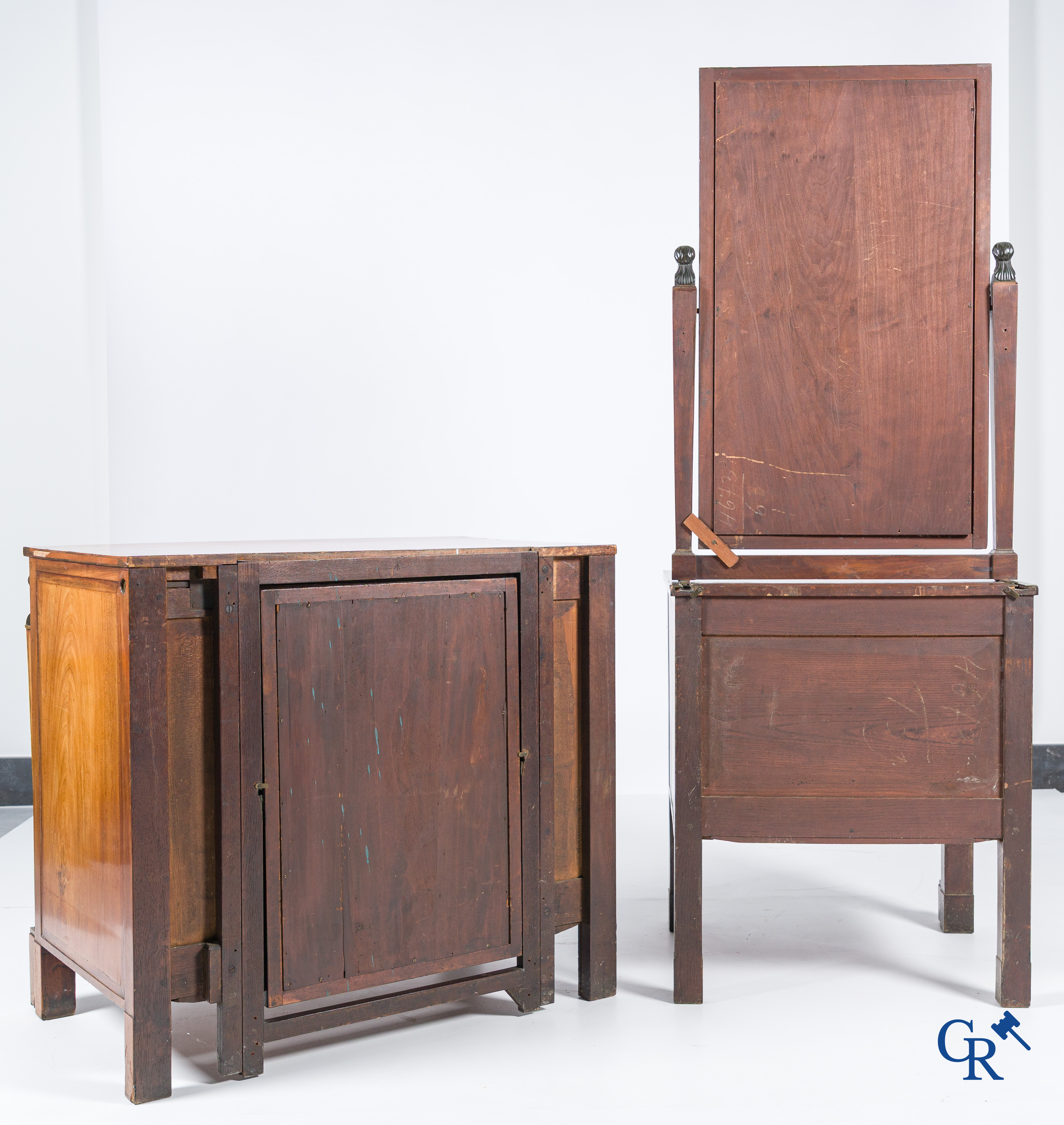 Chapuis, a mahogany wooden men's dressing table and ladies' dressing table with chiseled bronzes. Empire, circa 1810.
