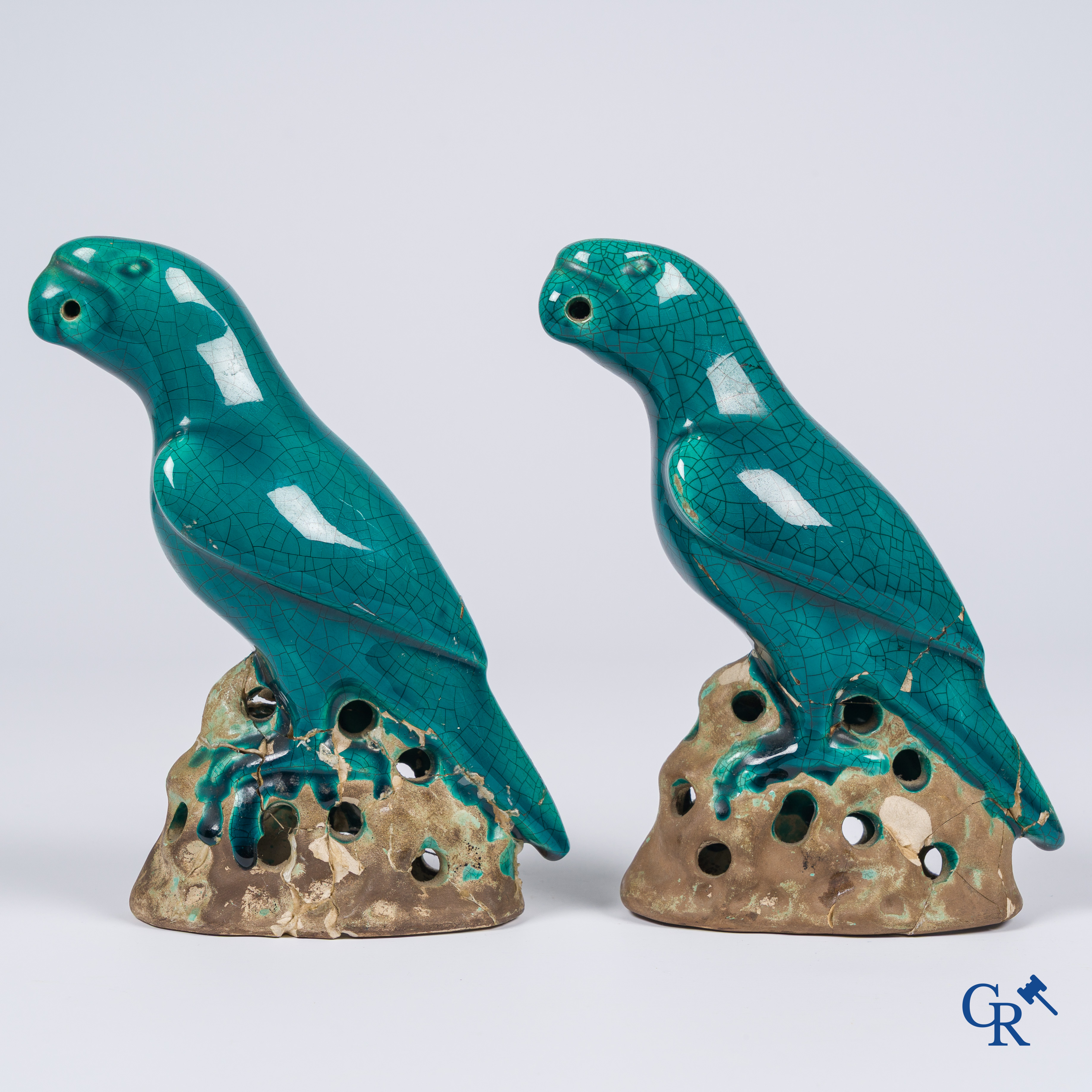 Asian Art, a pair of turquoise glazed ceramic parrots.