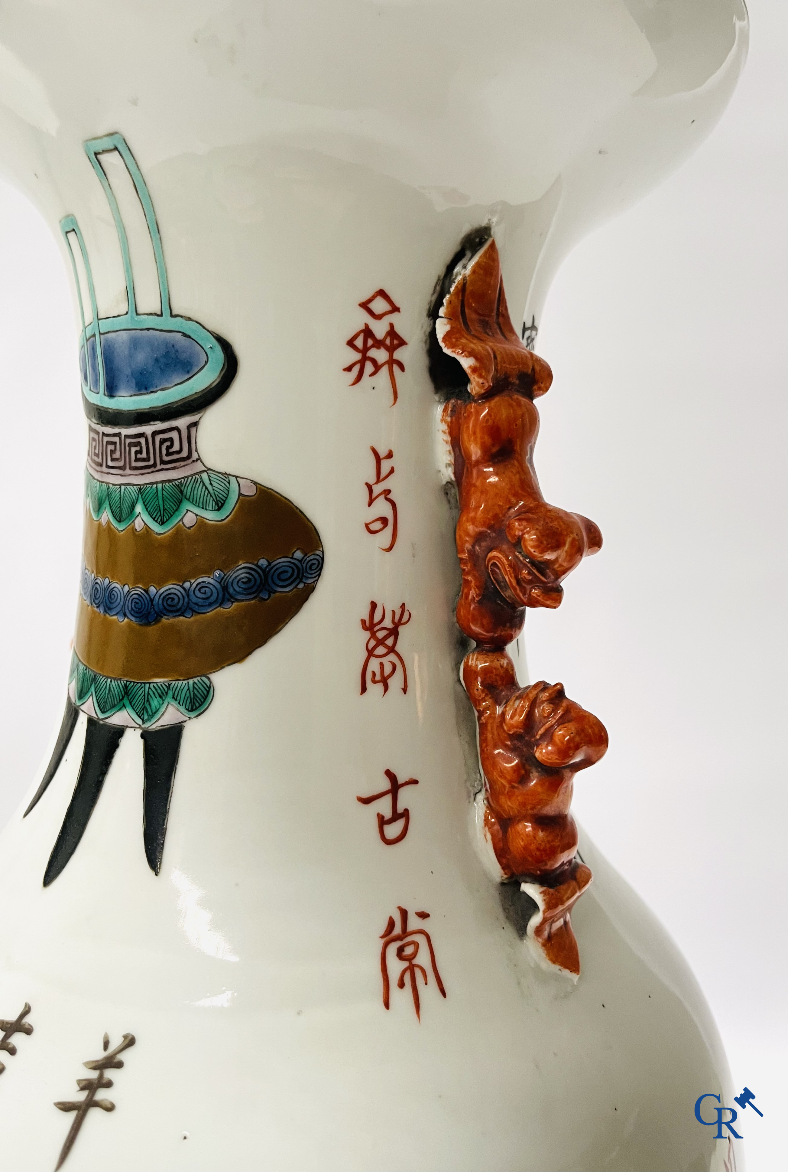 Asian Art, 2 Chinese famille rose vases decorated with antiques and a calligraphic text. 19th century.