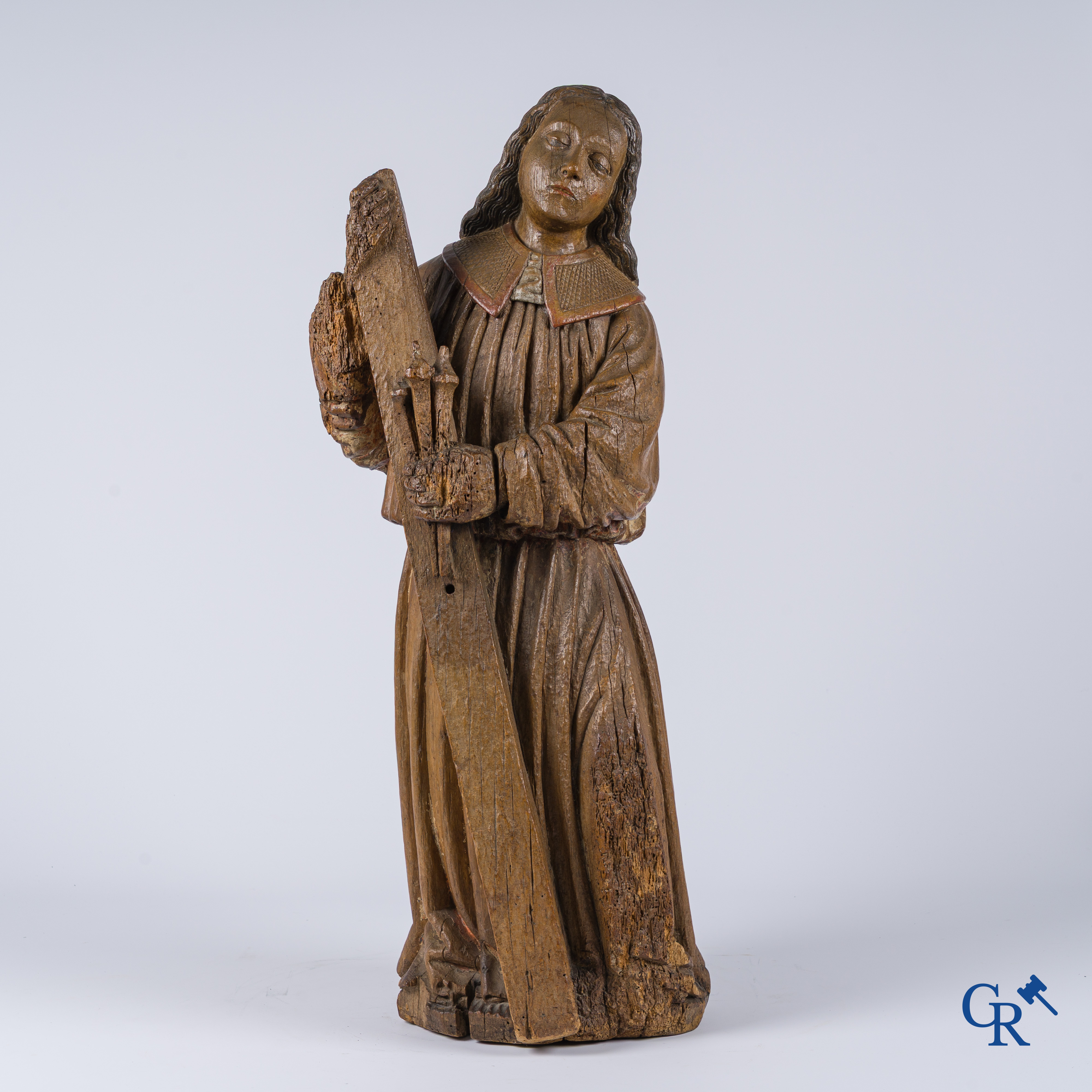 Religious objects, an antique wood carved representation of an archangel. Traces of polychromy.