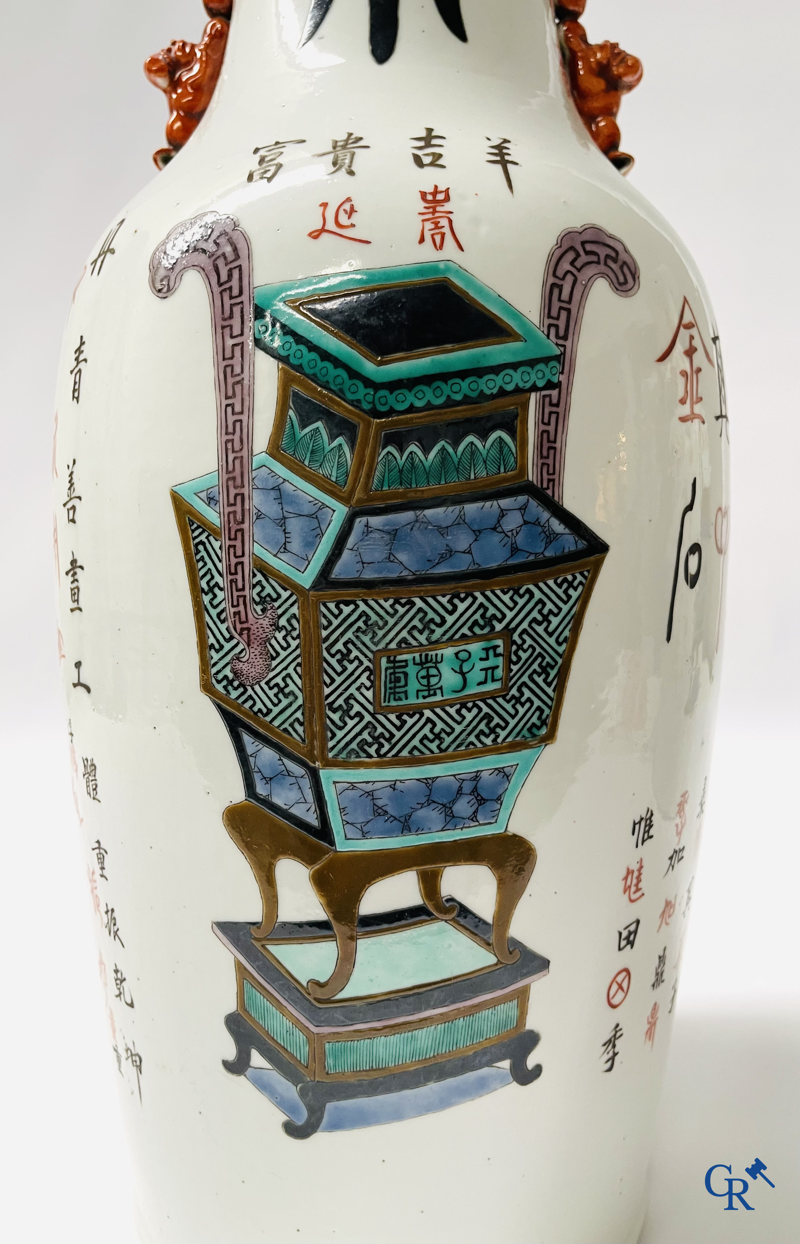 Asian Art, 2 Chinese famille rose vases decorated with antiques and a calligraphic text. 19th century.
