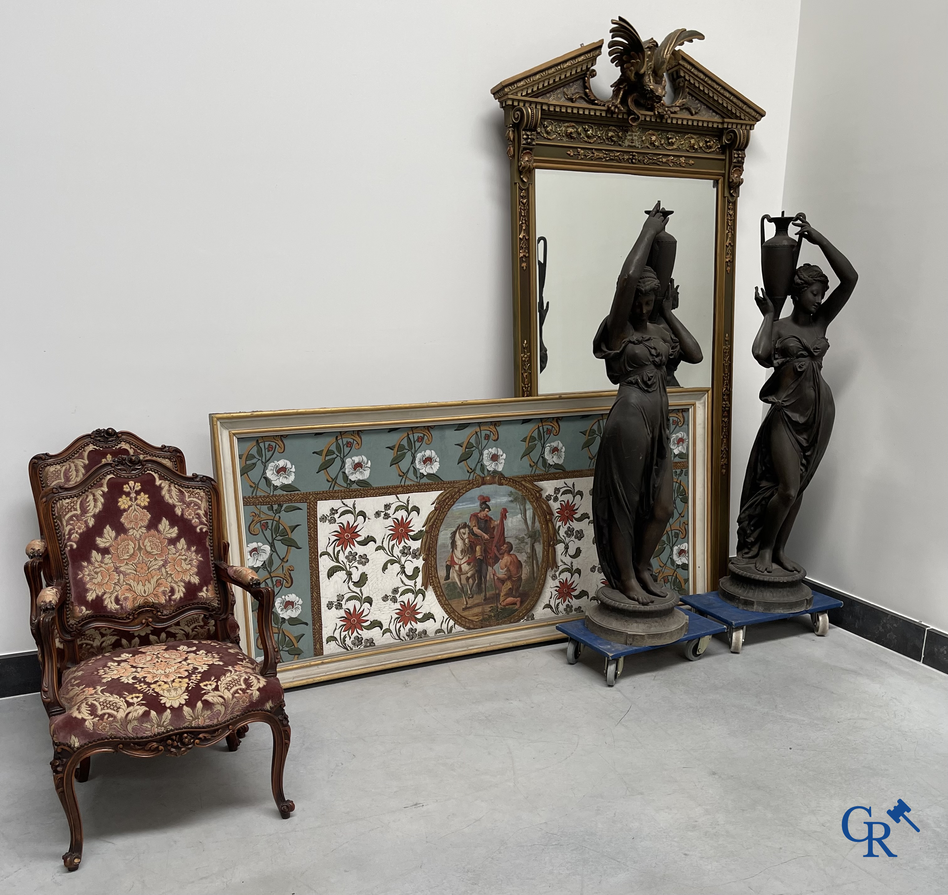 A large patinated fireplace mirror with a dragon. Around 1900.