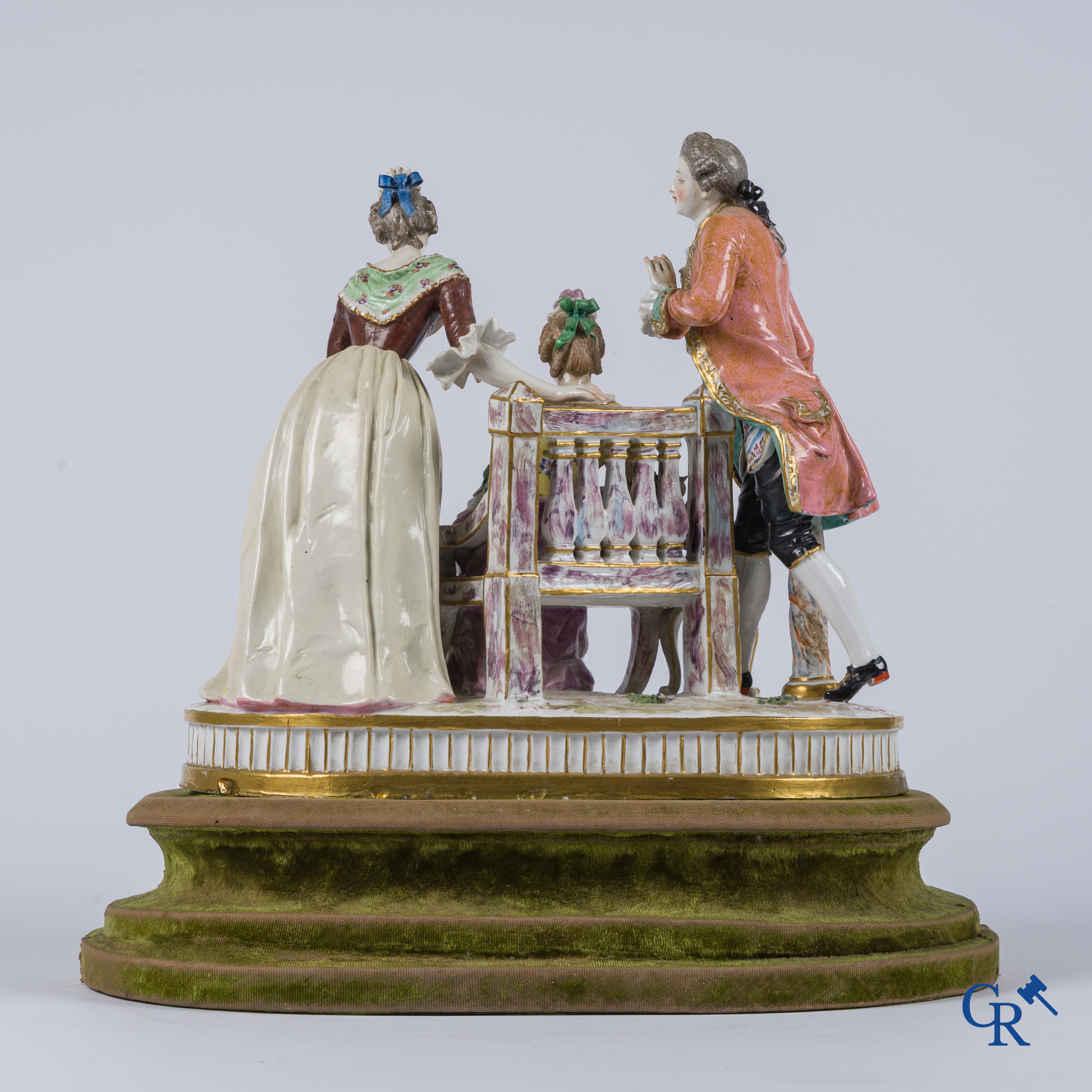 Porcelain. An exceptional group in multi-coloured and gilded porcelain. Marked. 19th century.