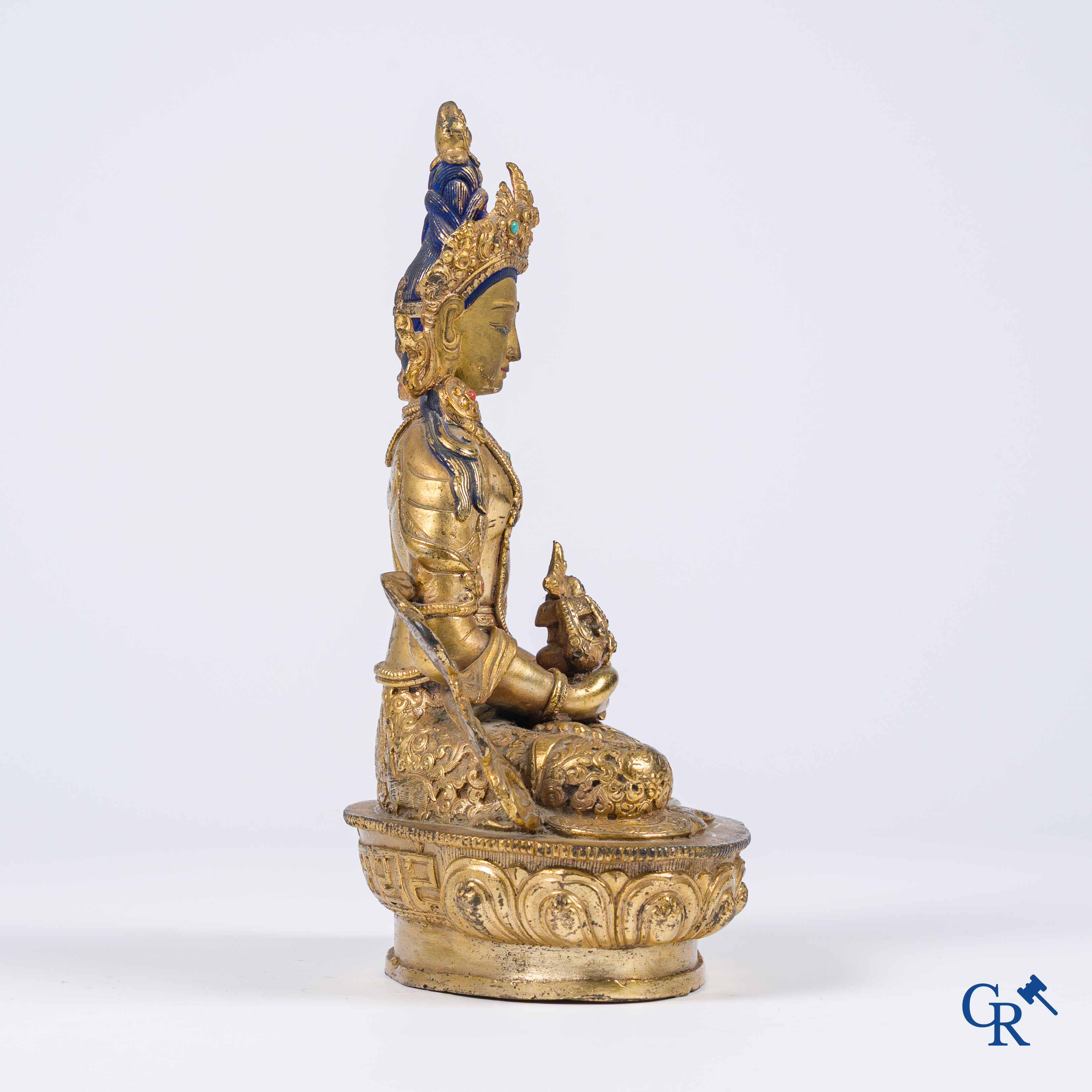 Asian Art, Tibet, a Chinese gilded Buddha Amitayus. Bronze with turquoise and coral inlay.