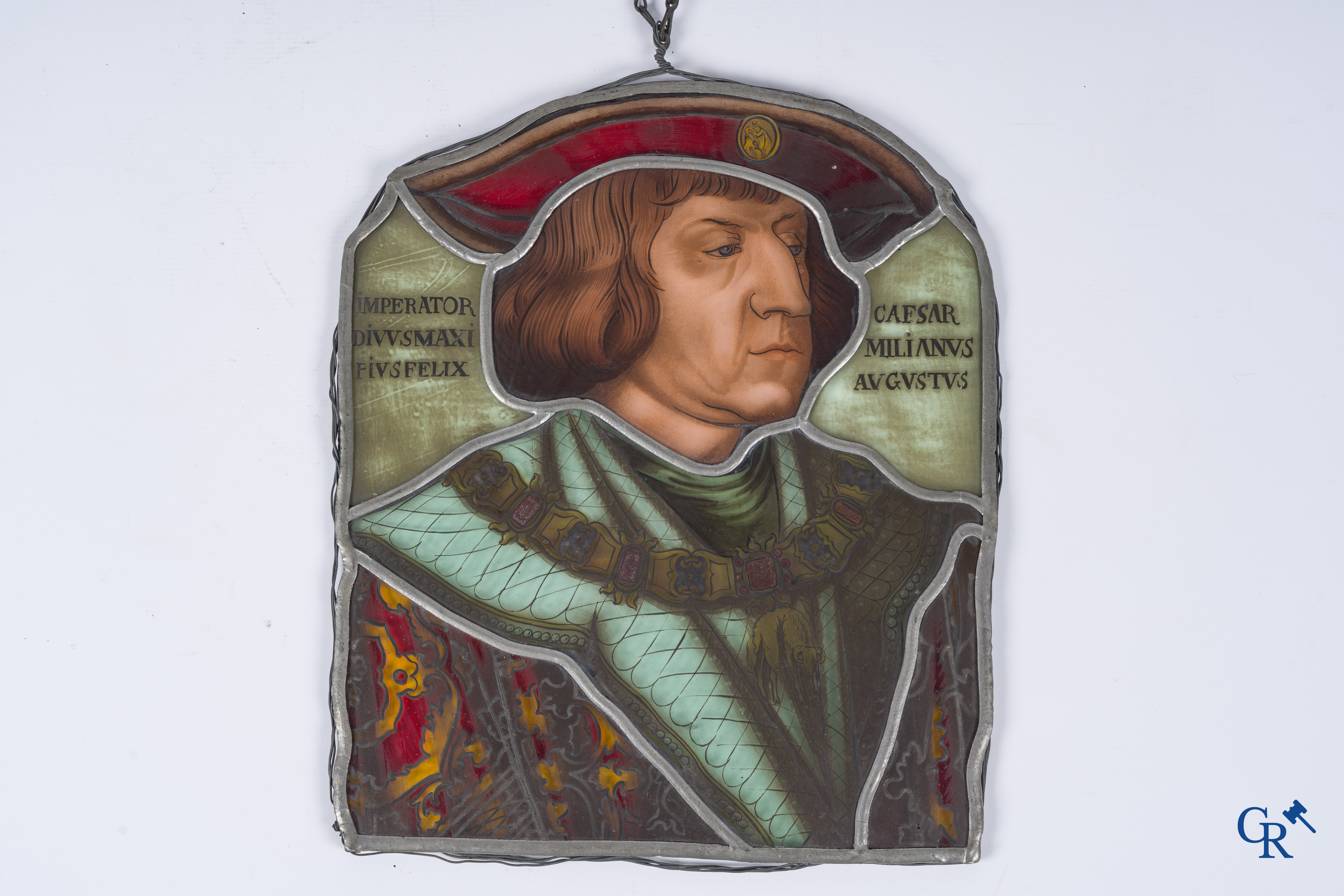 A fragment of an antique stained glass with the portrait of Maximilian I of Austria.