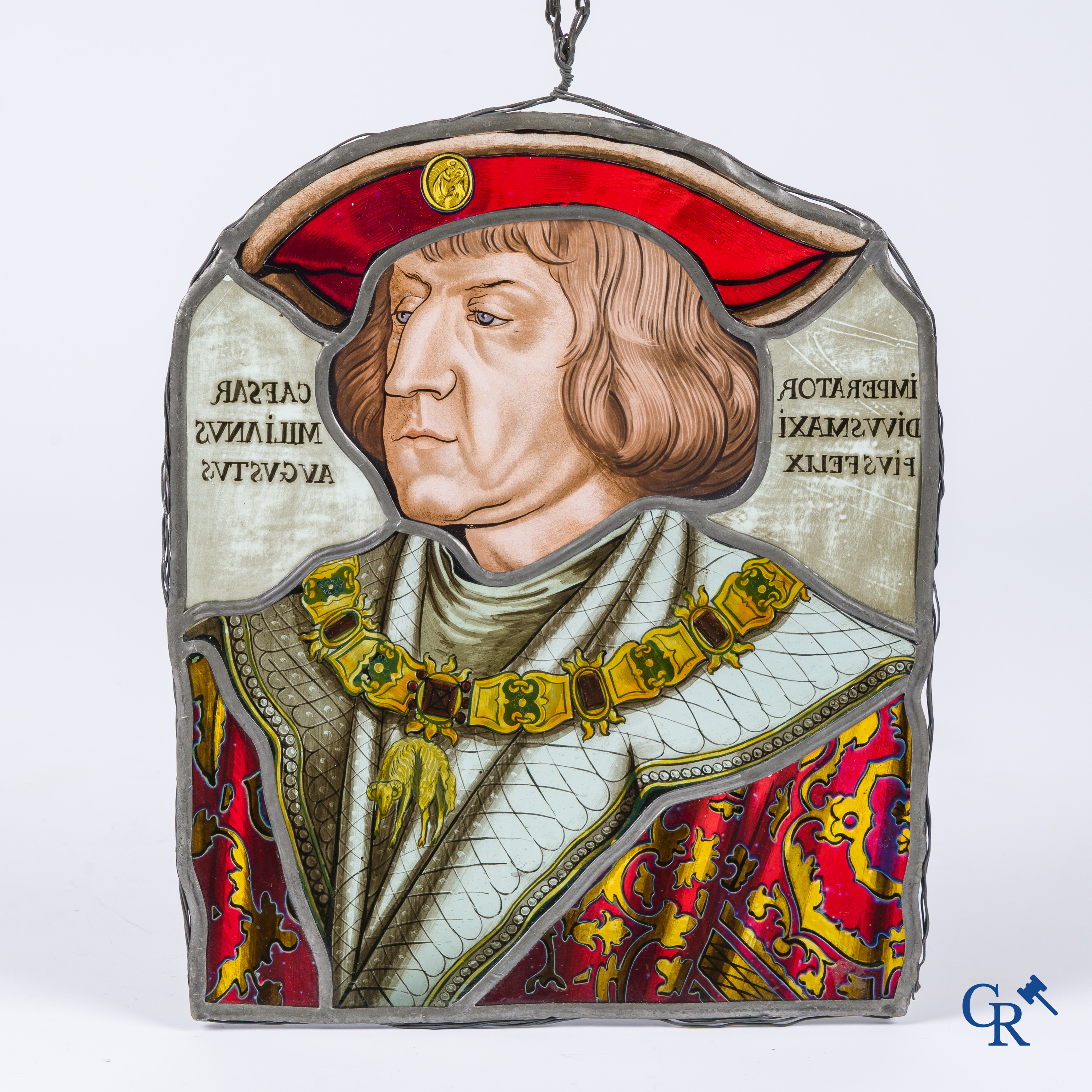 A fragment of an antique stained glass with the portrait of Maximilian I of Austria.
