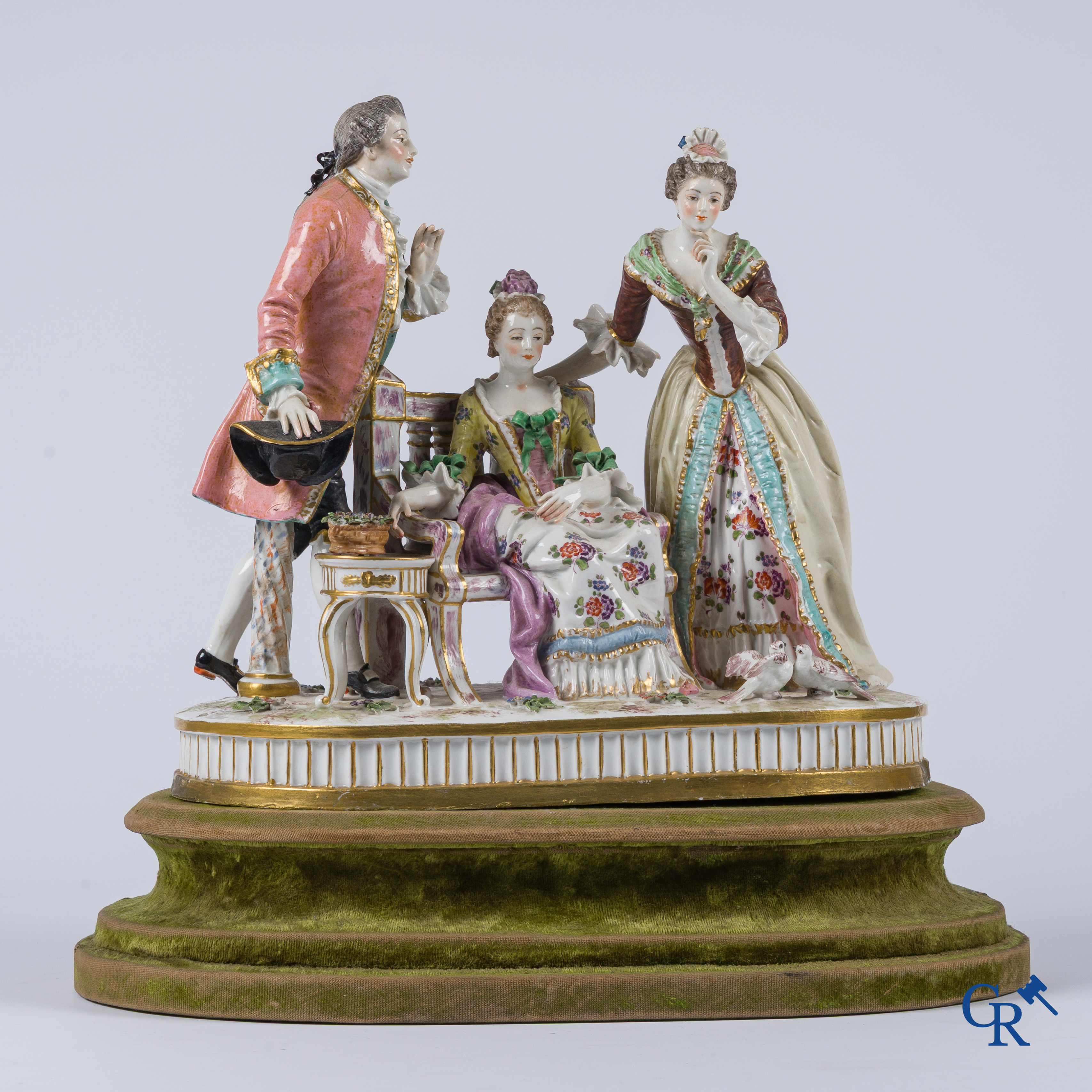 Porcelain. An exceptional group in multi-coloured and gilded porcelain. Marked. 19th century.