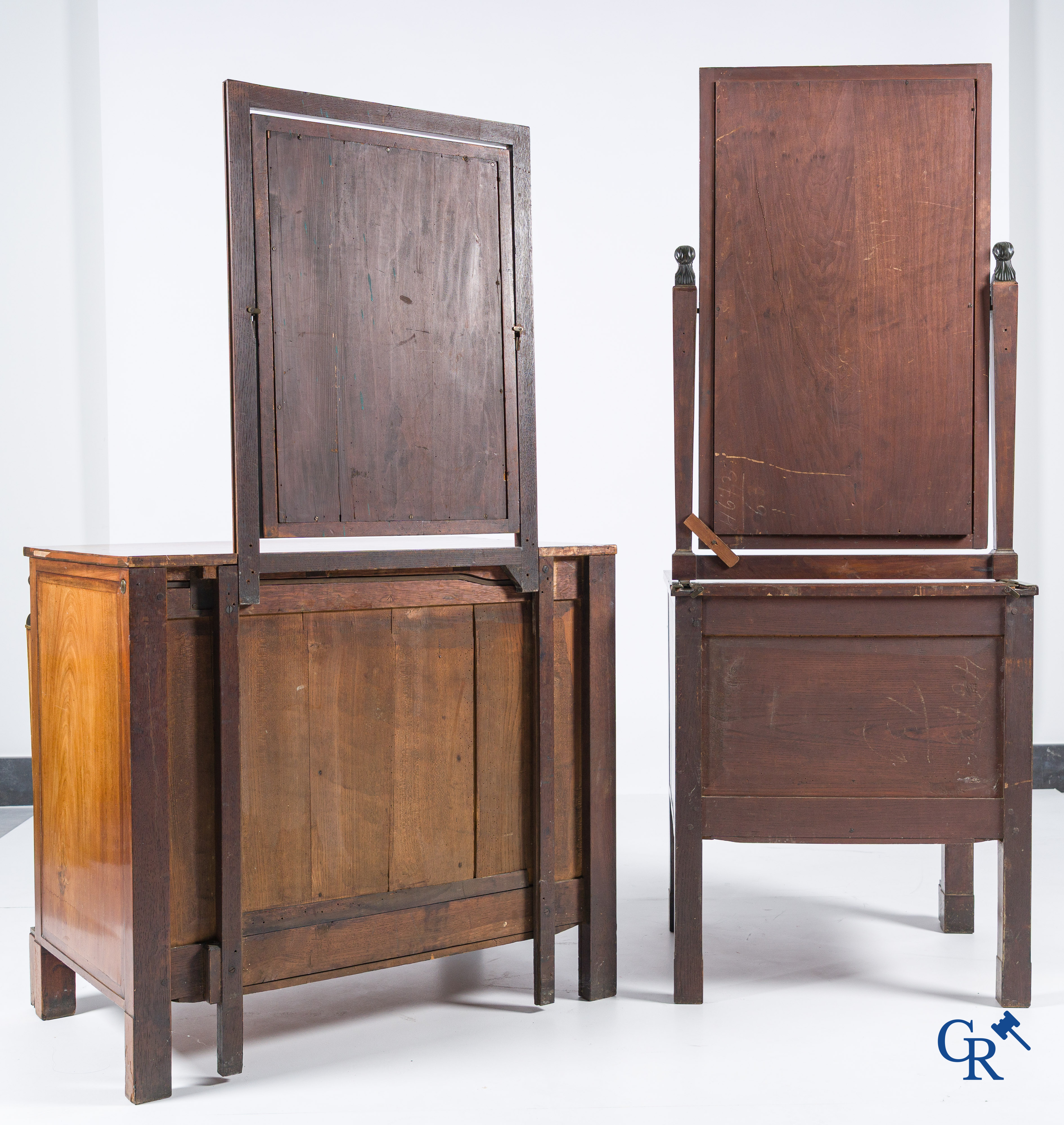 Chapuis, a mahogany wooden men's dressing table and ladies' dressing table with chiseled bronzes. Empire, circa 1810.