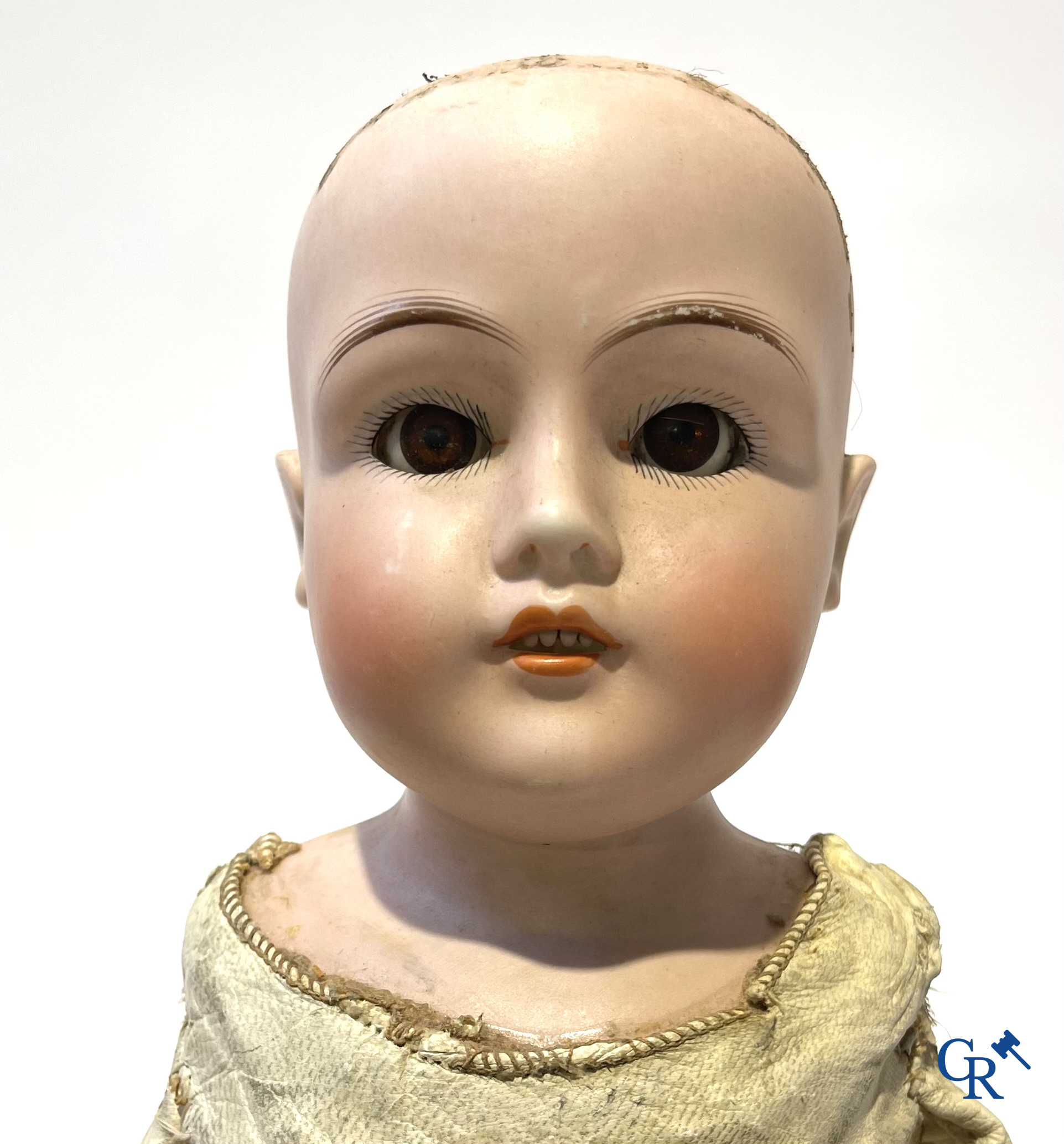 Old toys, 2 antique dolls with porcelain head and an automaton with music. Marked.