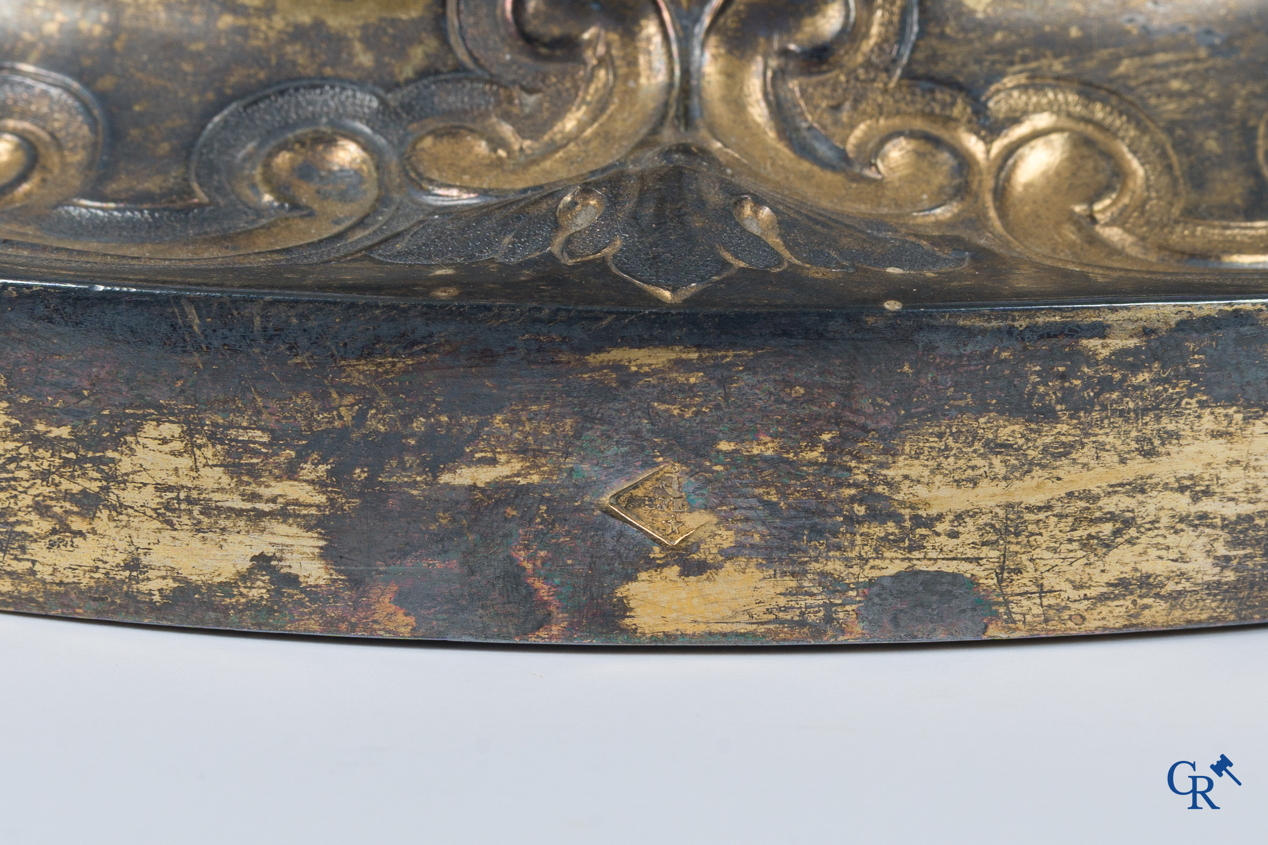 Martin & Dejean, orfèvres. A relief decorated chalice in silver and vermeil. Paris, 1st half of the 19th century.