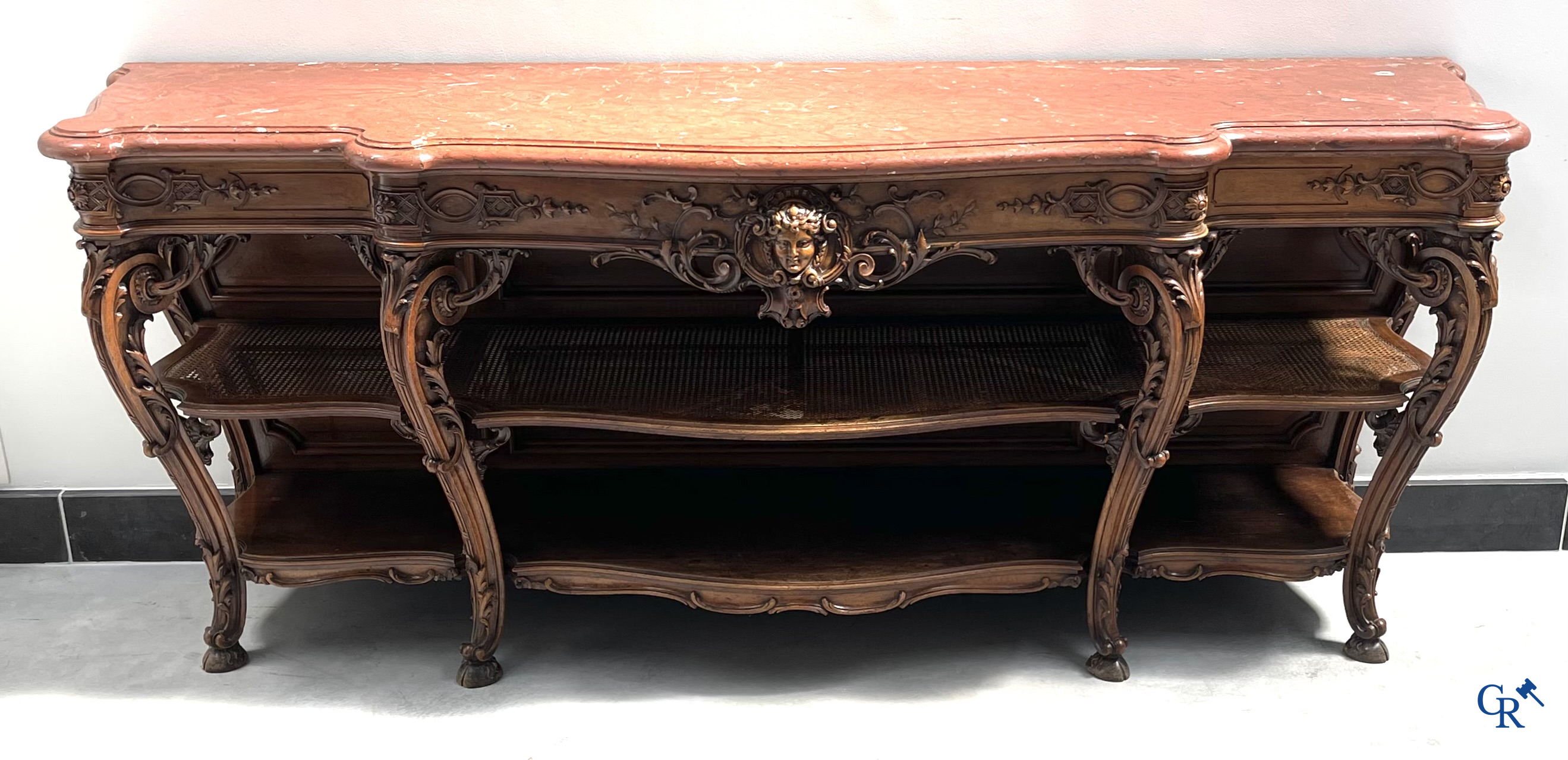 Maison Roll, 42, Rue Faubourg St. Antoine Paris. An exceptionally dessert furniture in carved walnut. LXVI style.