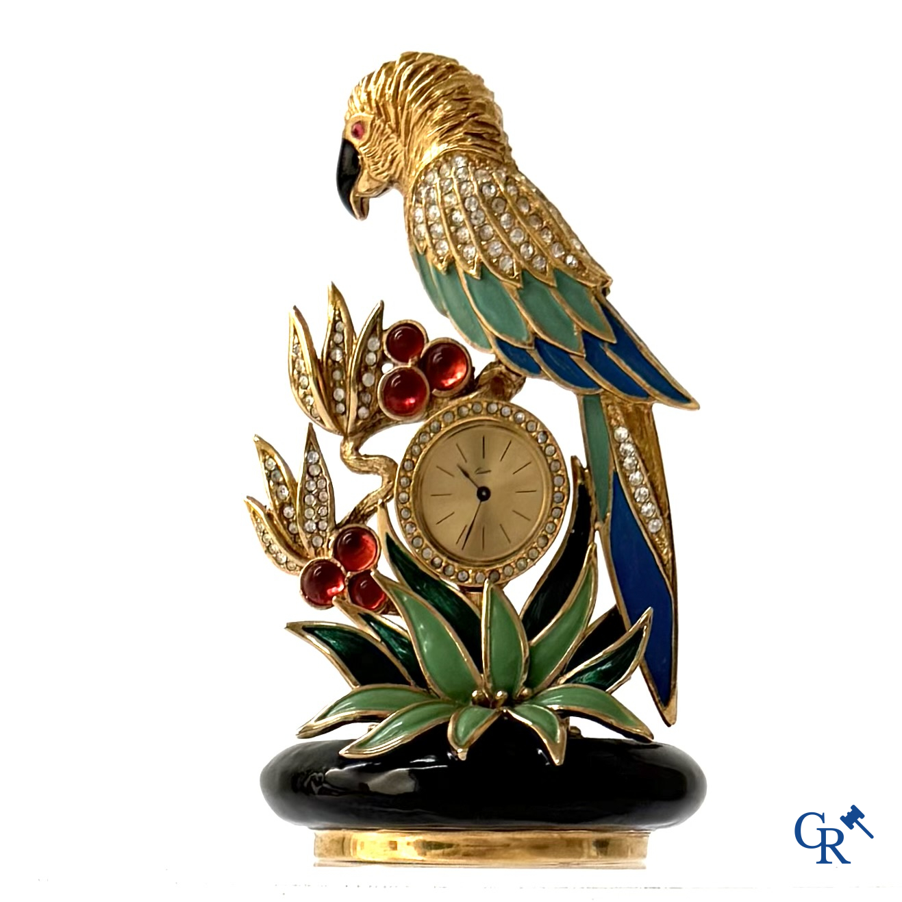 Uurwerken. Een klein klokje met voorstelling van een papegaai. Emaille op verguld metaal ingelegd met gesteente.