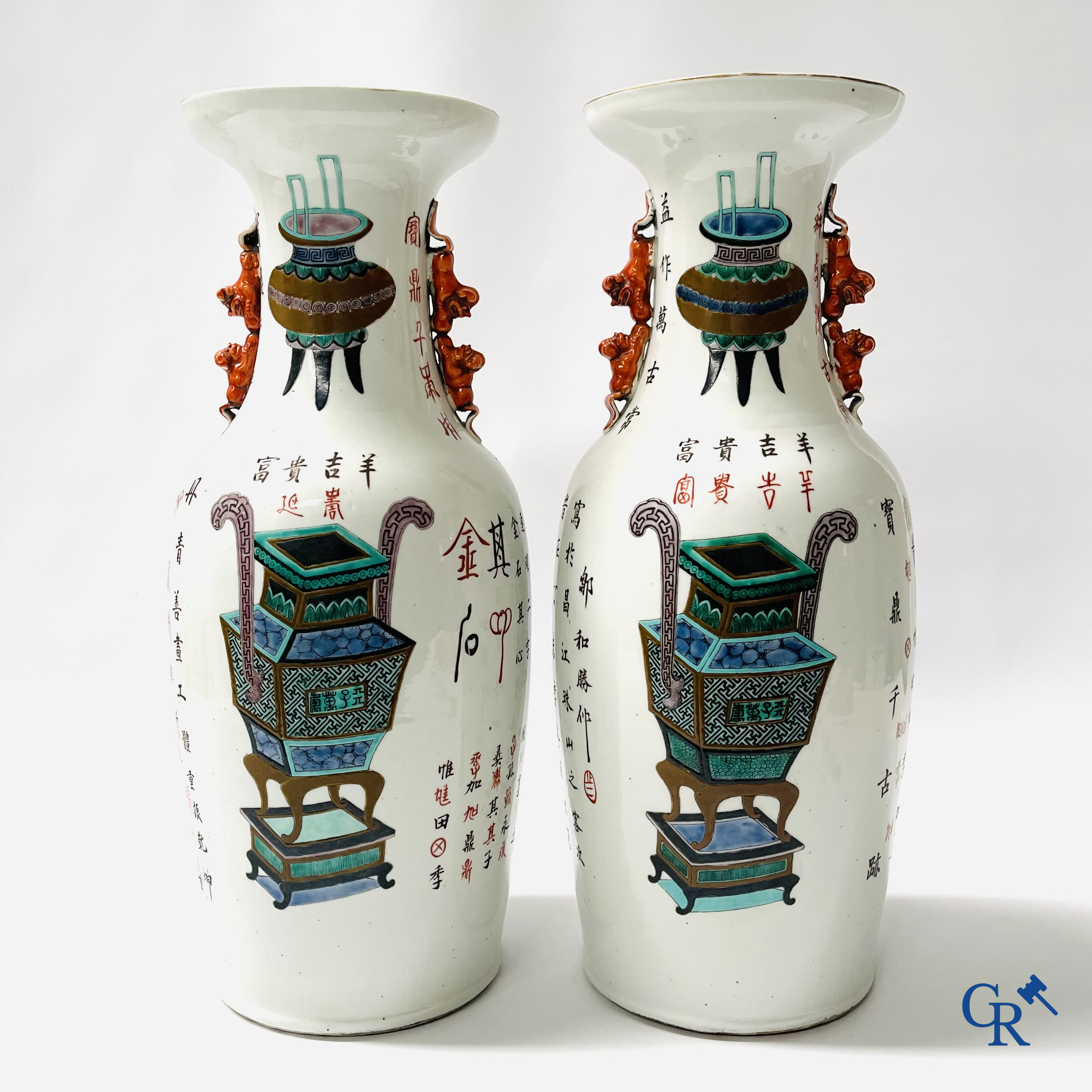 Asian Art, 2 Chinese famille rose vases decorated with antiques and a calligraphic text. 19th century.