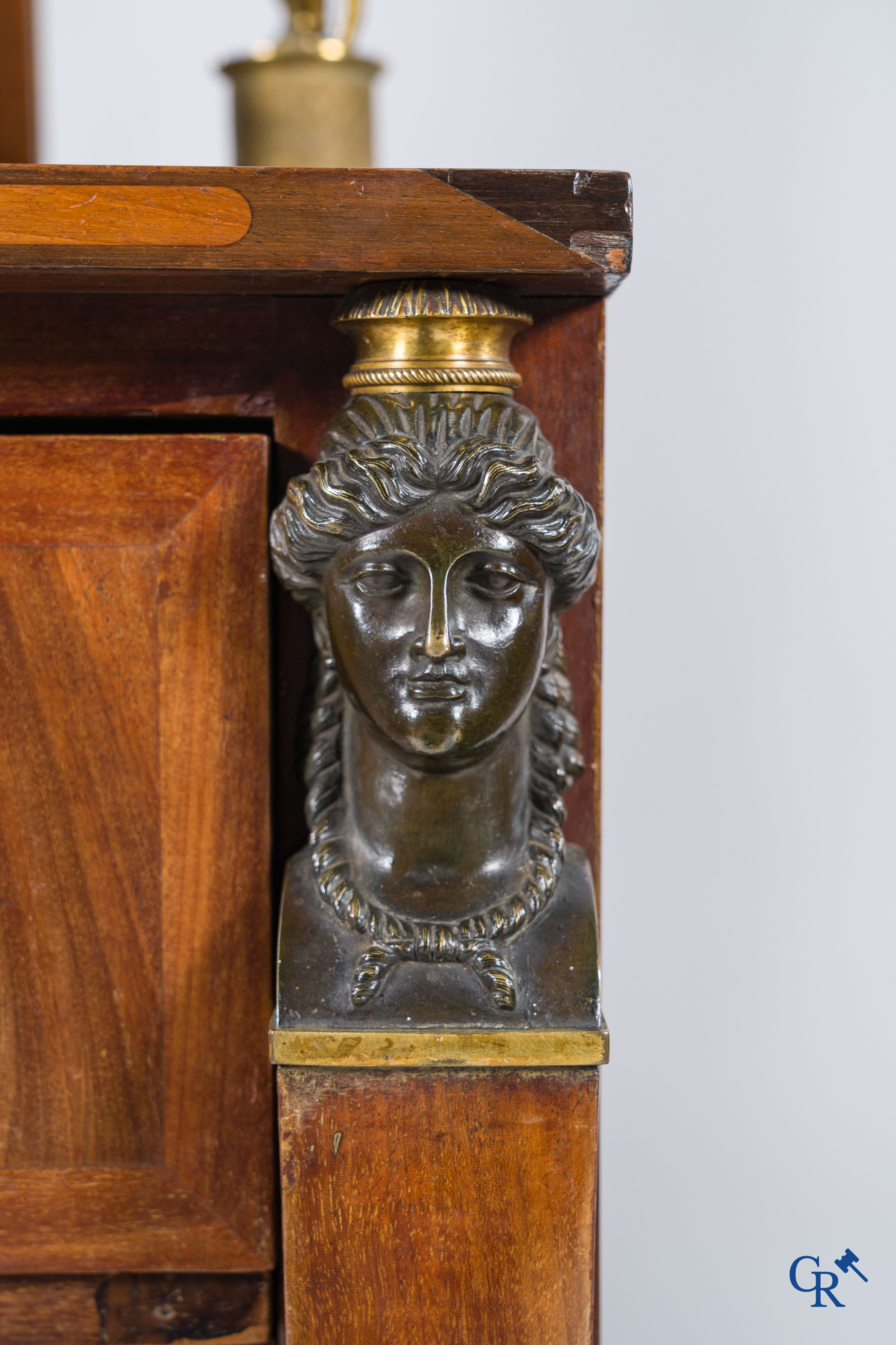 Chapuis, a mahogany wooden men's dressing table and ladies' dressing table with chiseled bronzes. Empire, circa 1810.