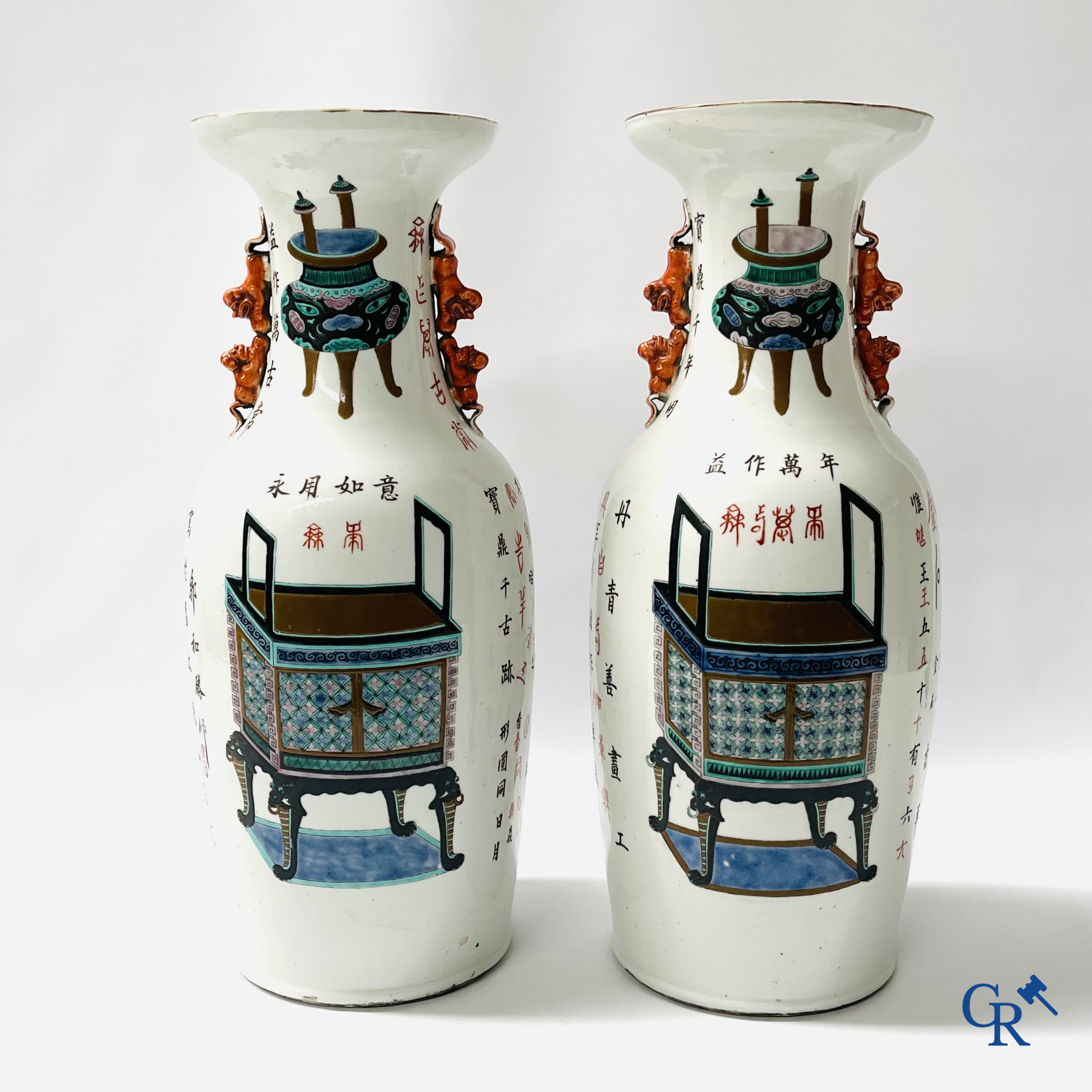 Asian Art, 2 Chinese famille rose vases decorated with antiques and a calligraphic text. 19th century.