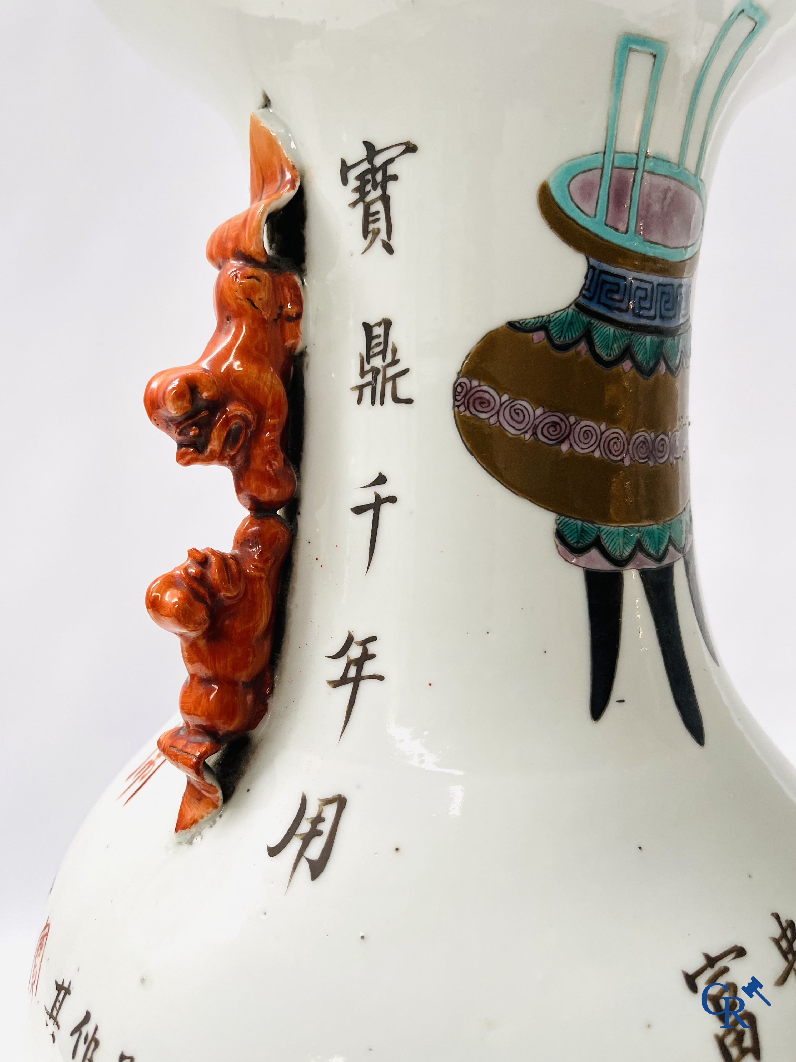 Asian Art, 2 Chinese famille rose vases decorated with antiques and a calligraphic text. 19th century.