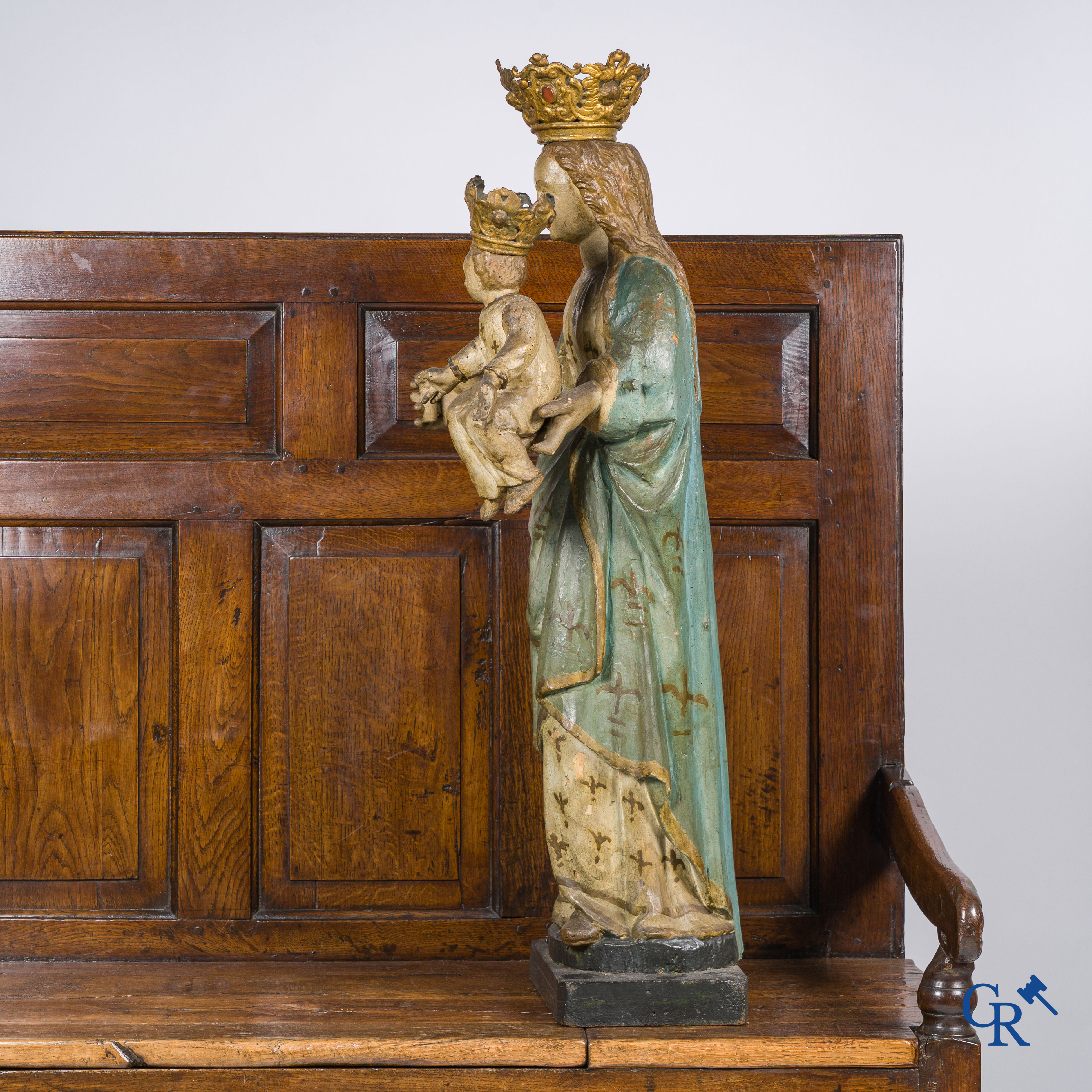 Wooden polychrome Baroque sculpture of Mary with child. The Crown inlaid with an amber-like rock.
