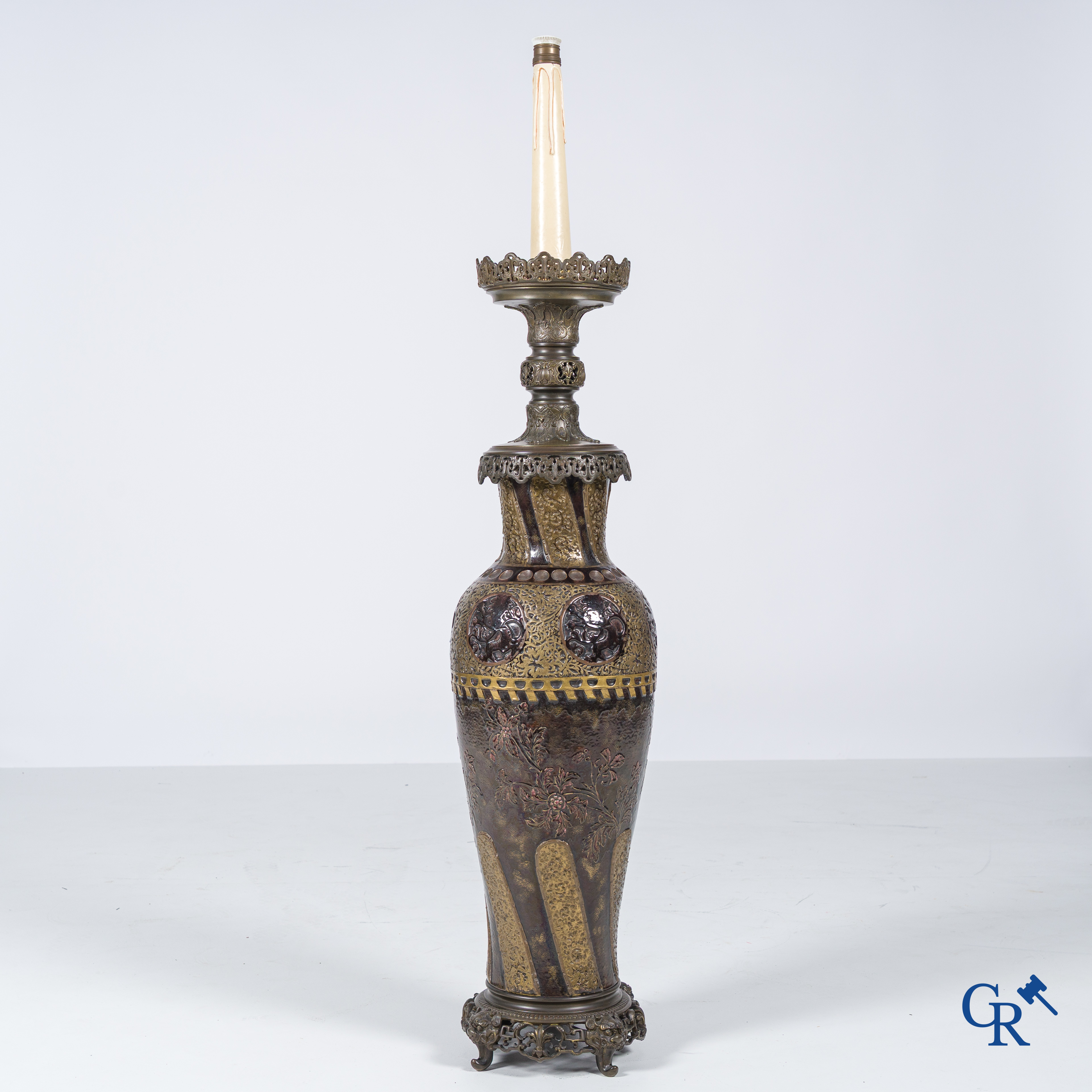 An imposing vase in French faience with bronze frames in Japonizing style mounted as a lamp. Circa 1890.