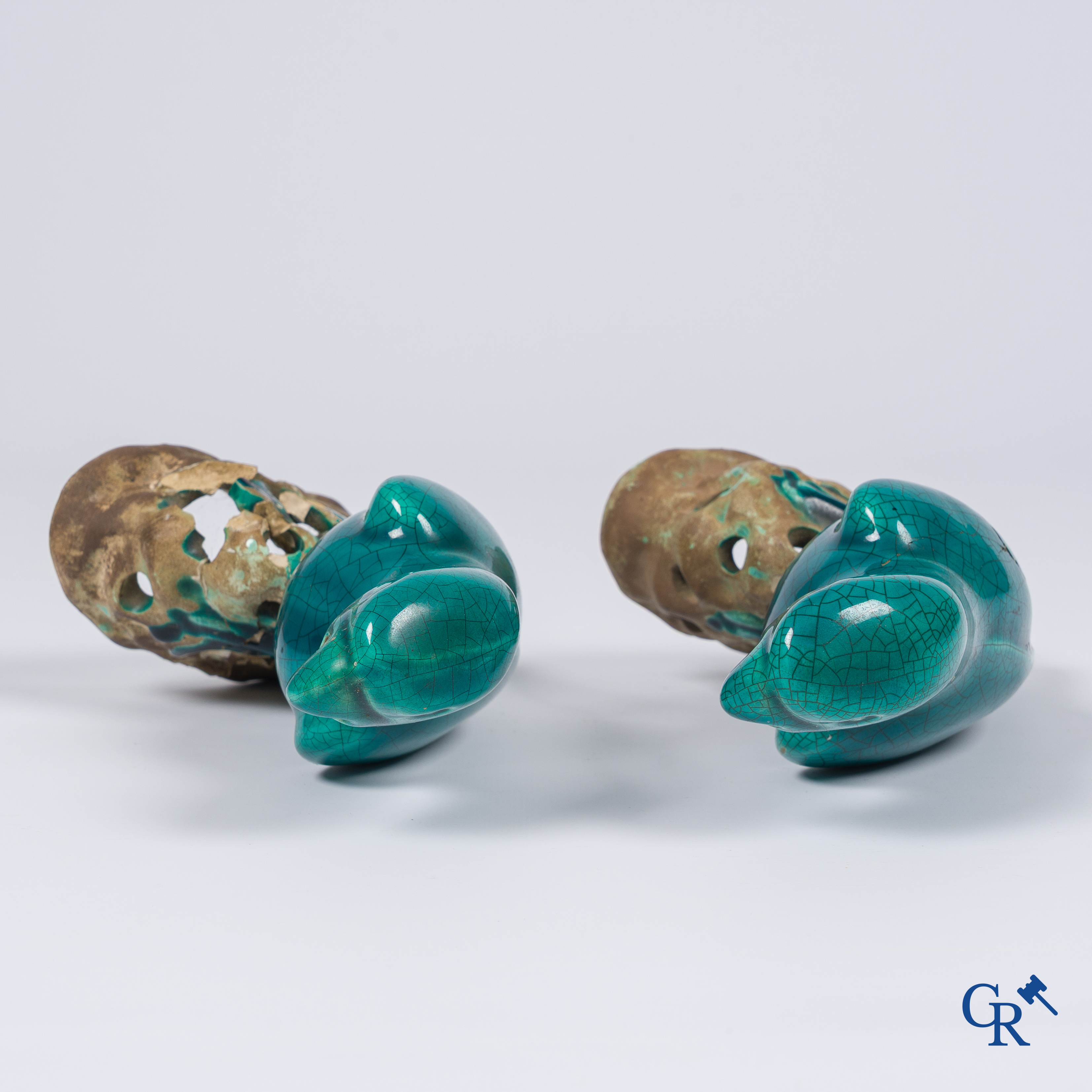 Asian Art, a pair of turquoise glazed ceramic parrots.