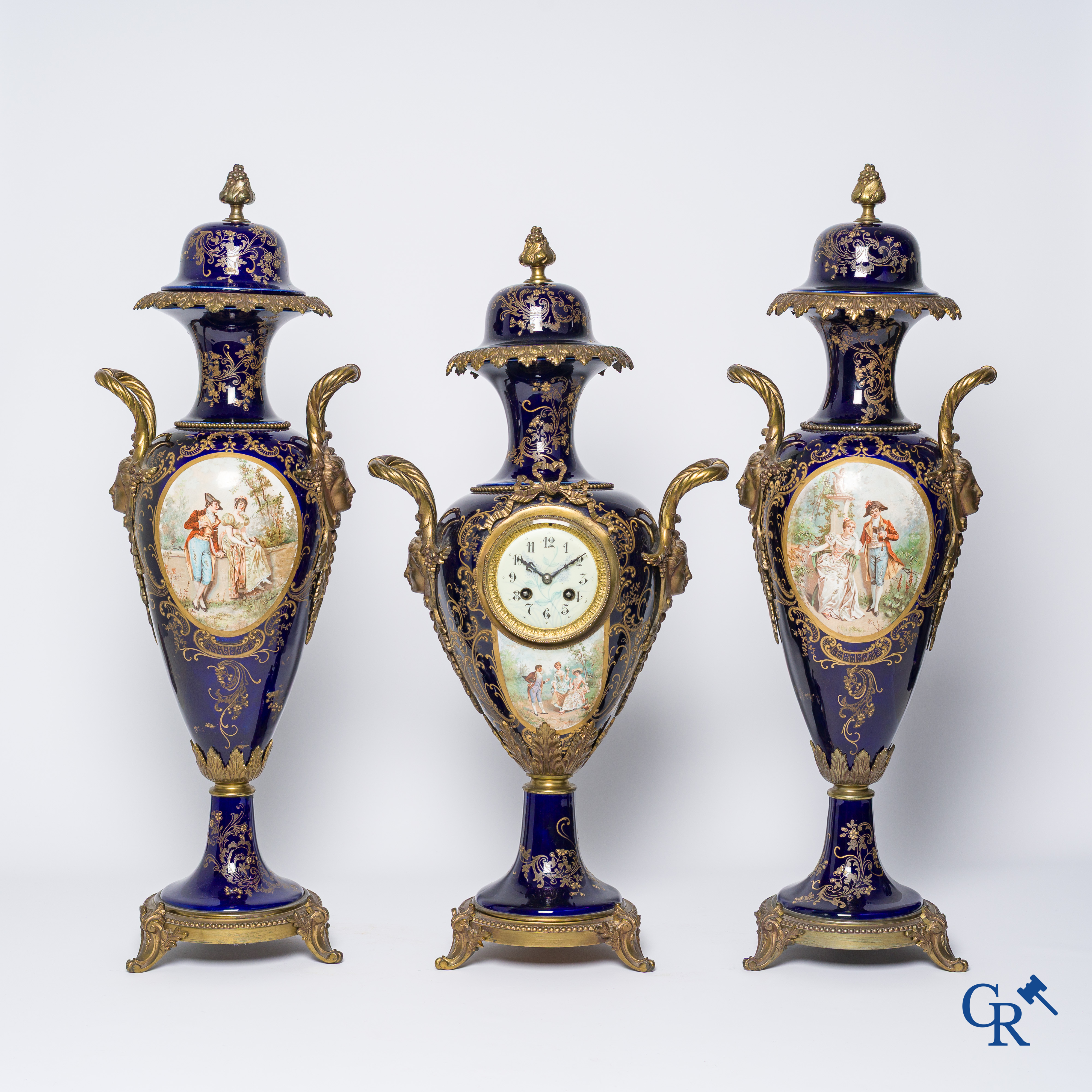 Sèvres, a large 3-piece clockset in Sèvres porcelain and bronze. French work circa 1900.