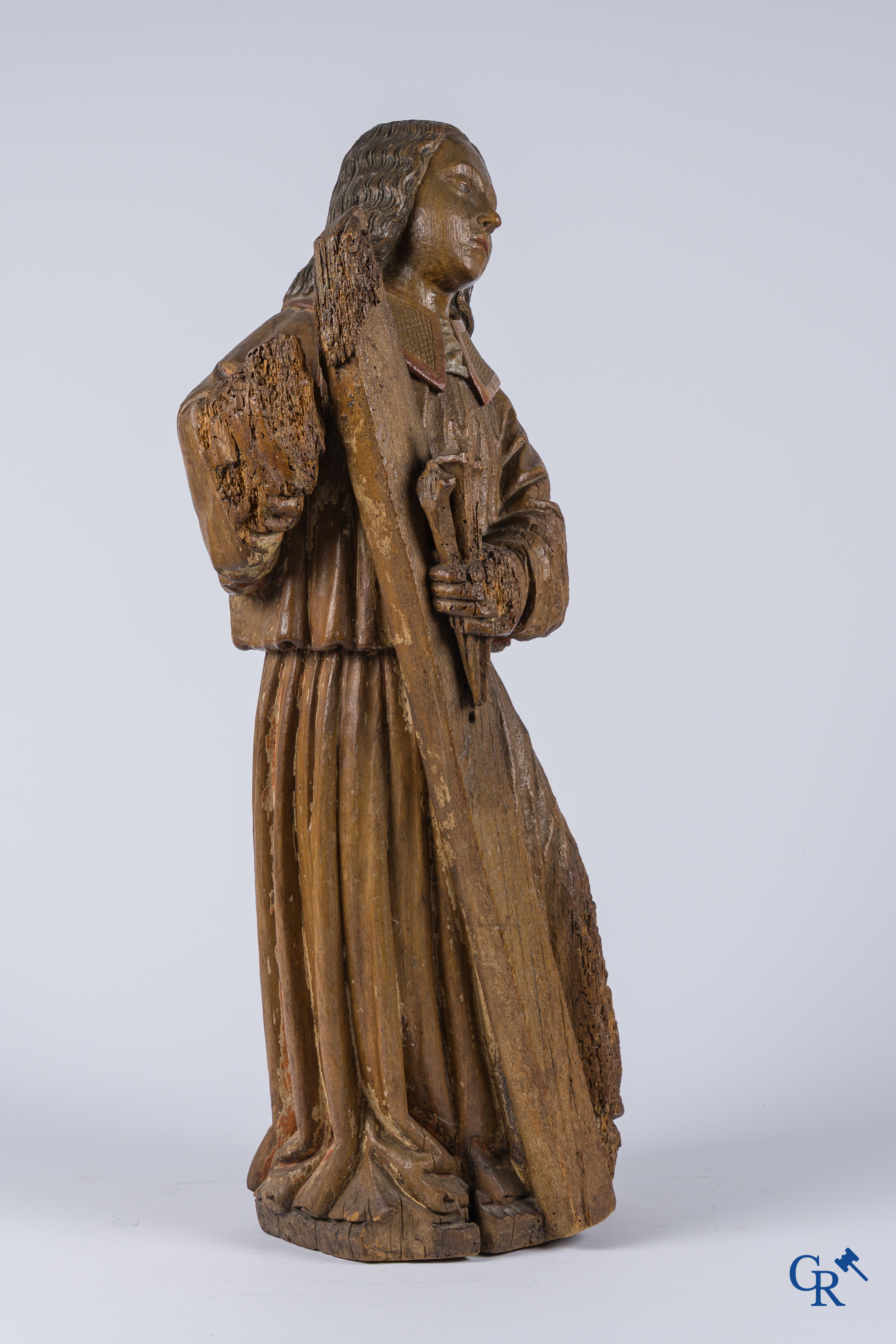 Religious objects, an antique wood carved representation of an archangel. Traces of polychromy.