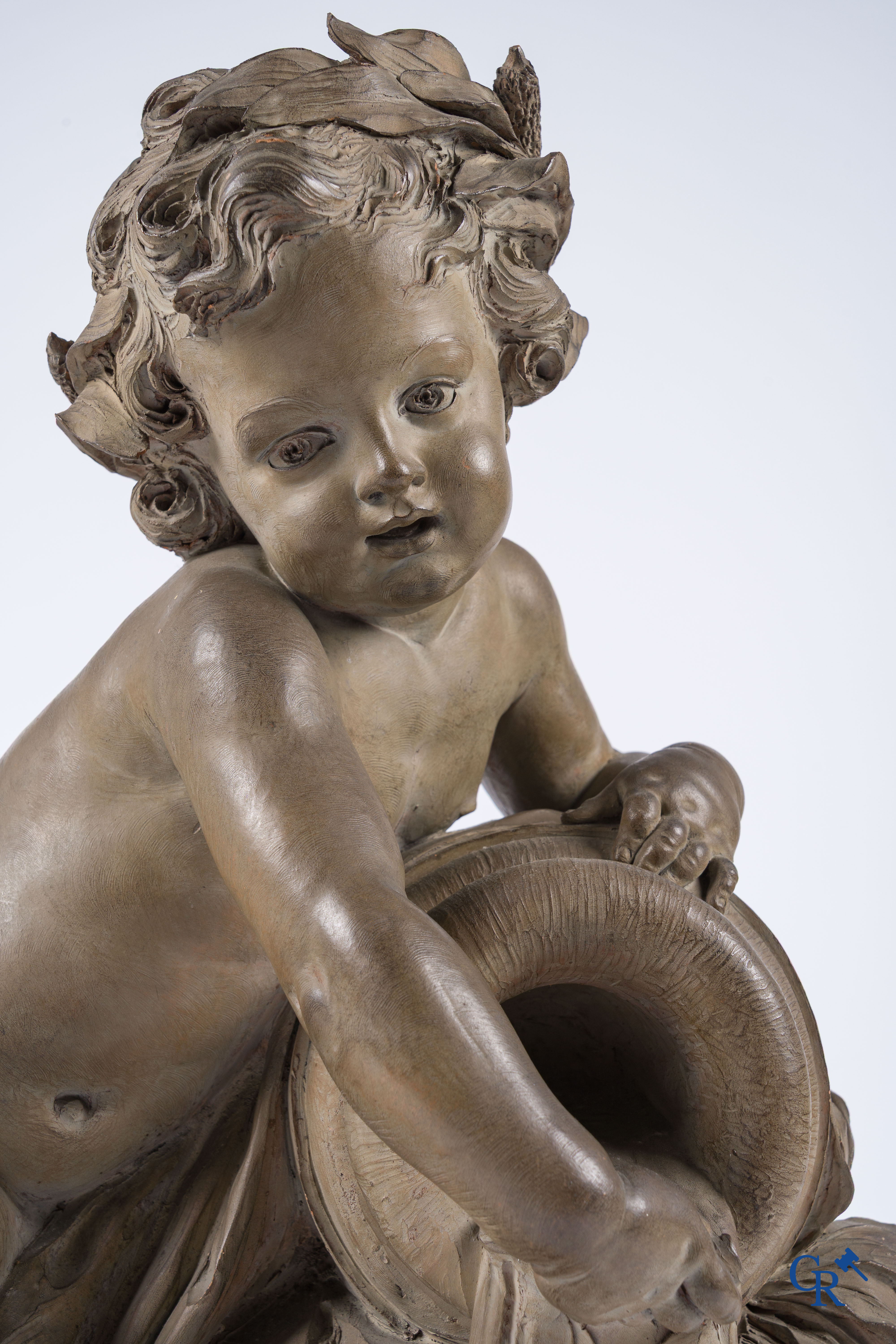 "La Source" A large terra cotta group on a wooden gilded pedestal. LXVI style. 19th century.