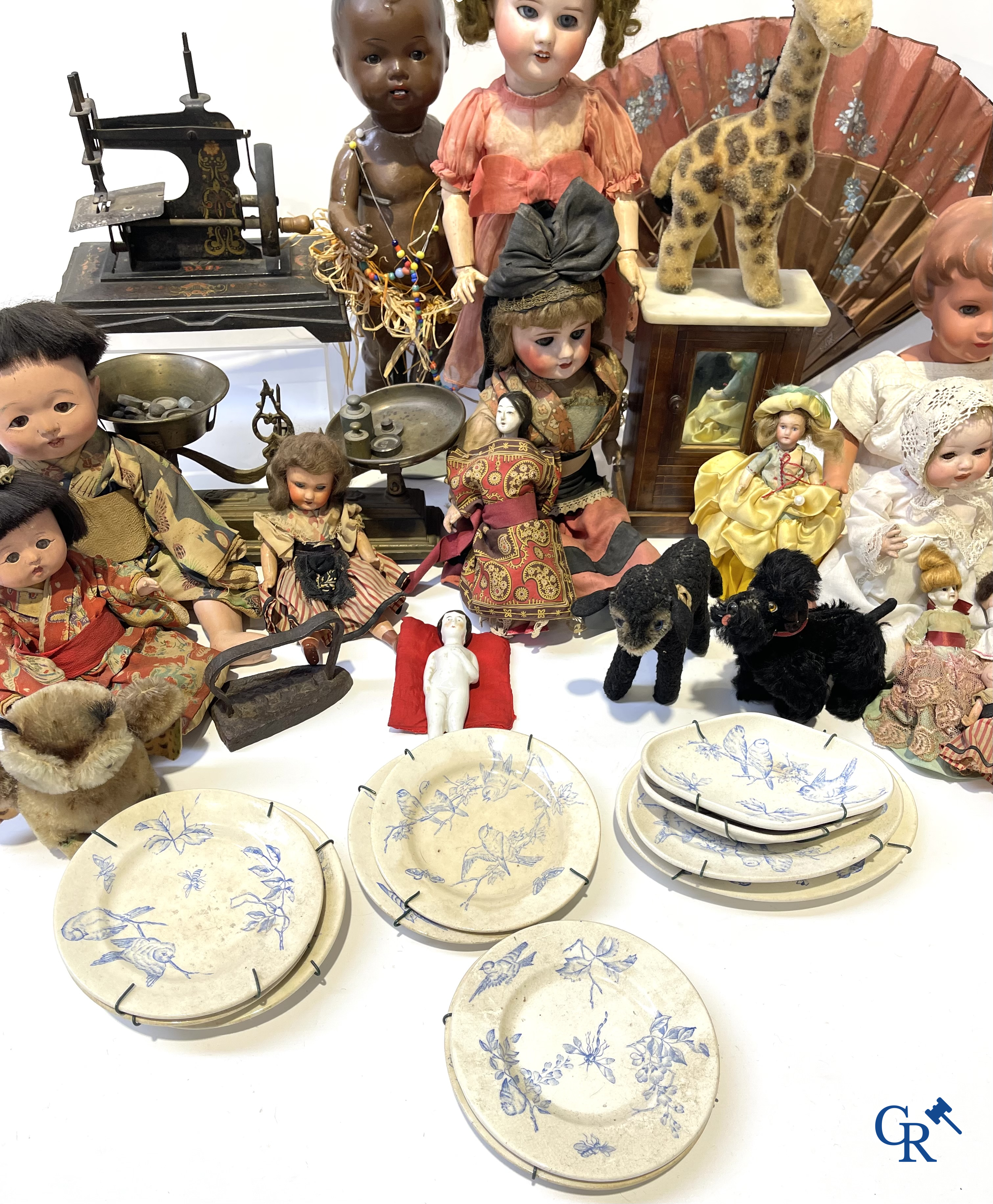 Old toys, a big lot with different antique dolls and collectibles.