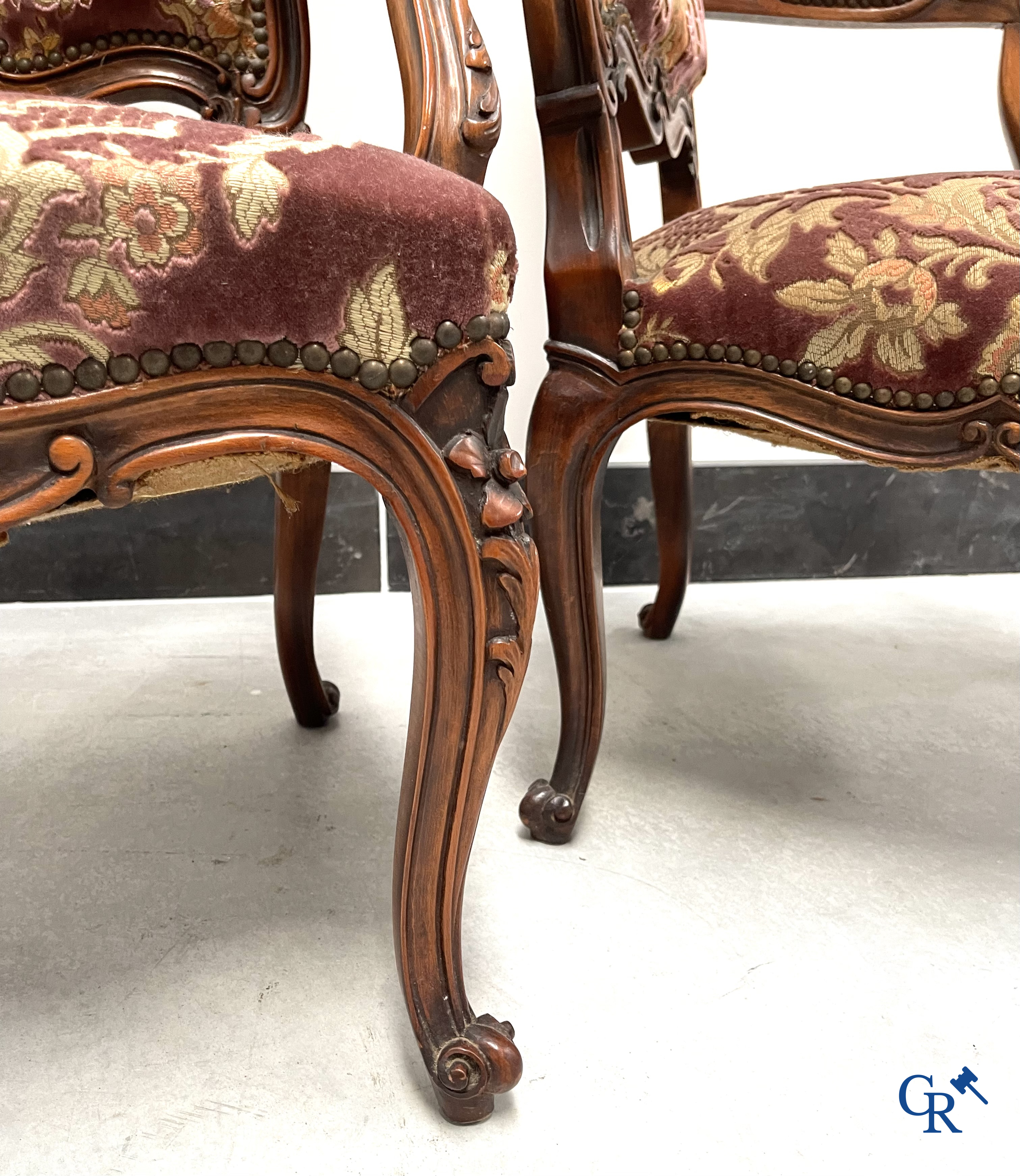 A set of 4 carved wood LXV-style armchairs.